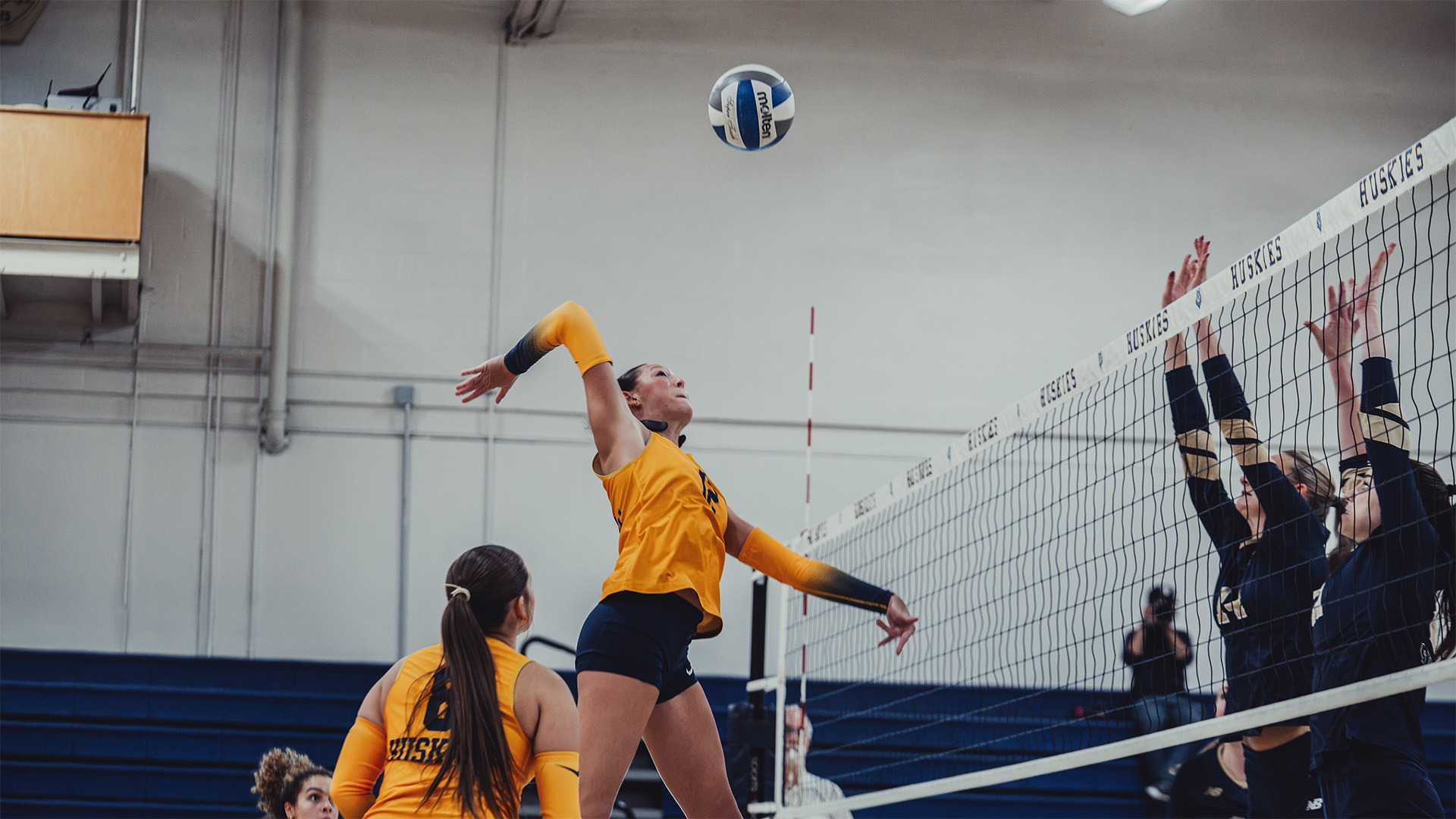 Haylie Bidegain Jumping for a Spike against Suffolk