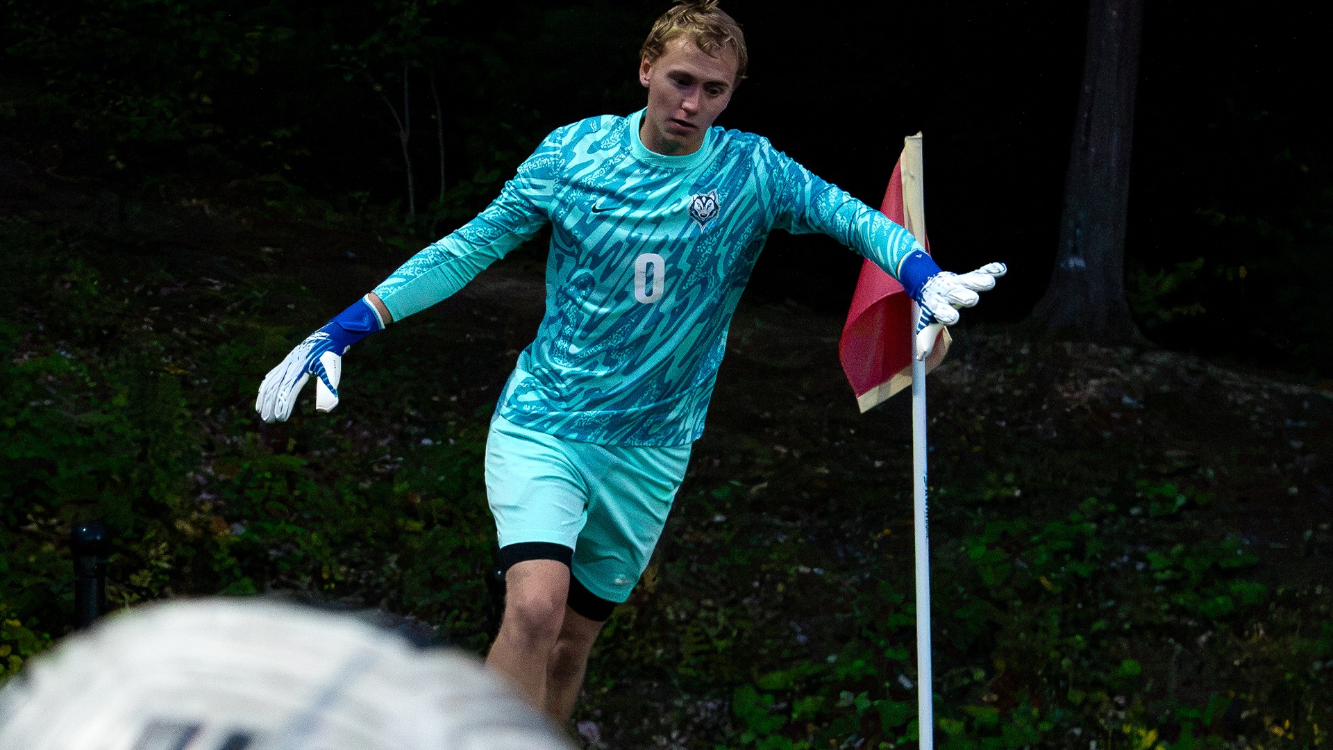 Owen Burns kicking ball