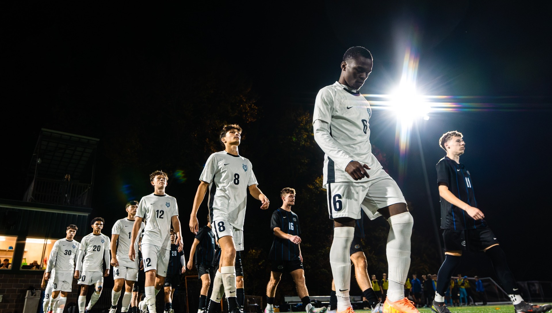 Men's Soccer starters during walk out