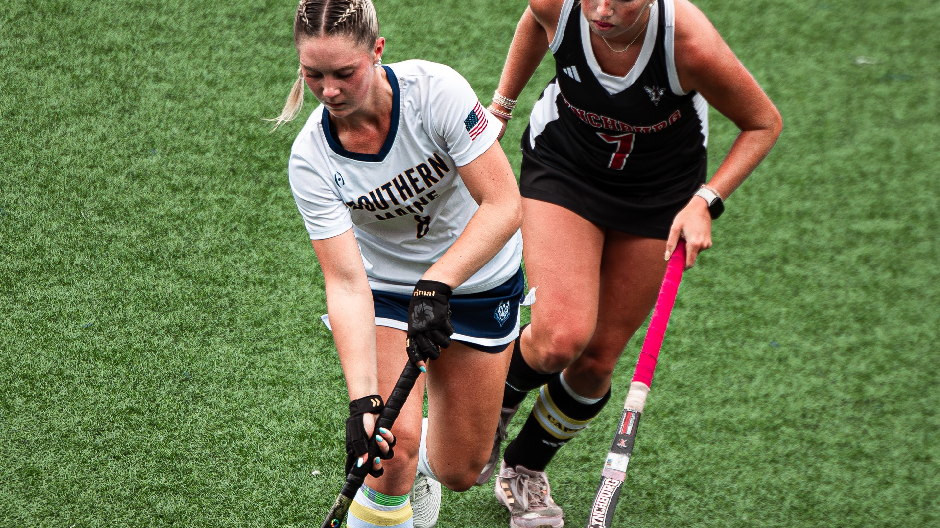 Leah THibodeau carrying the ball against Lynchburg