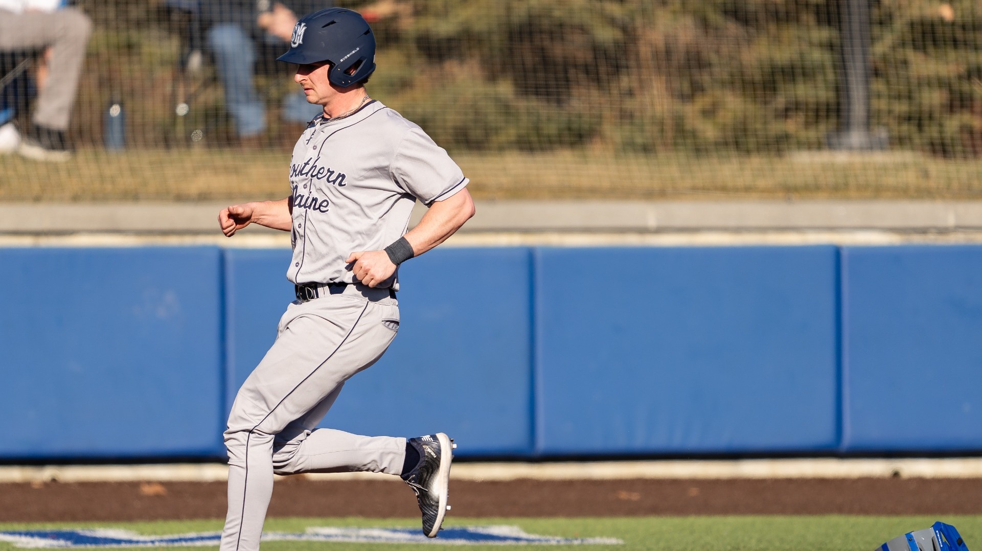 Kyle Douin Crossing Home Plate at Colby College