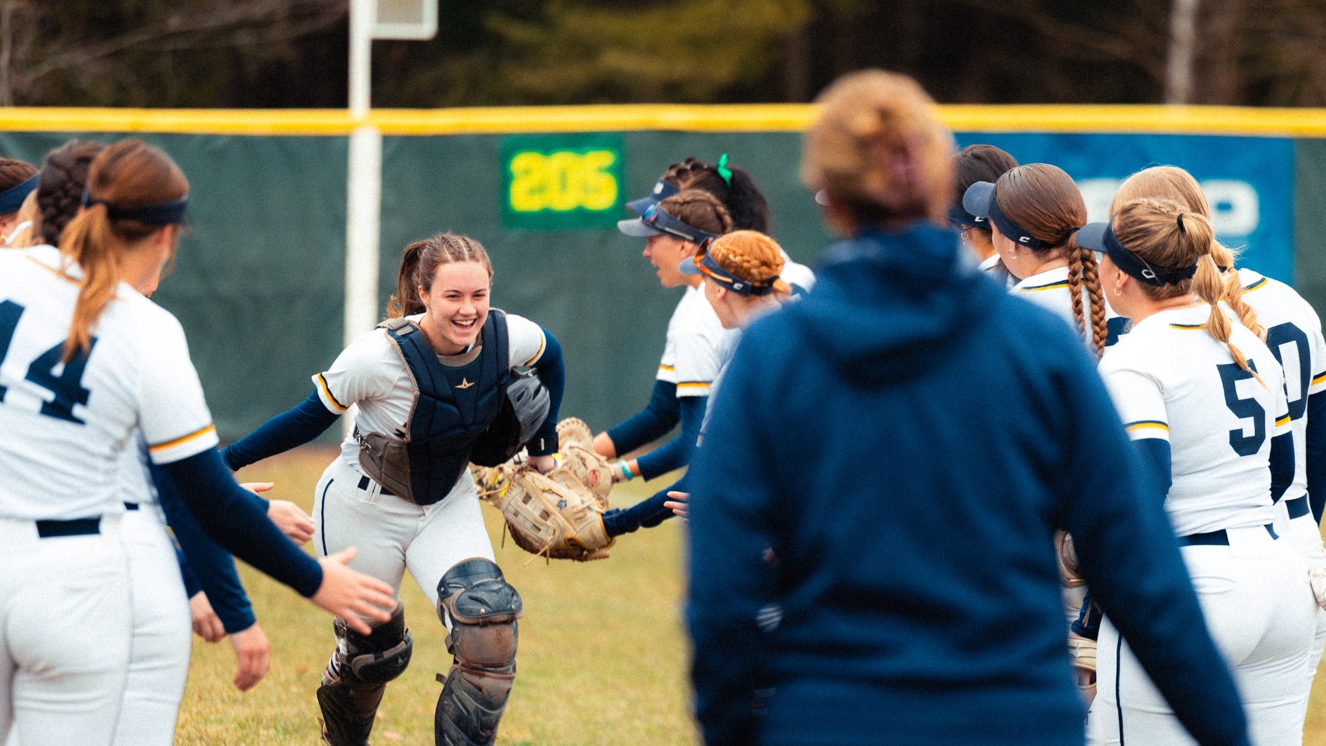 Mackenzie Renner Runs Through Team Huddle for Starting Lineup