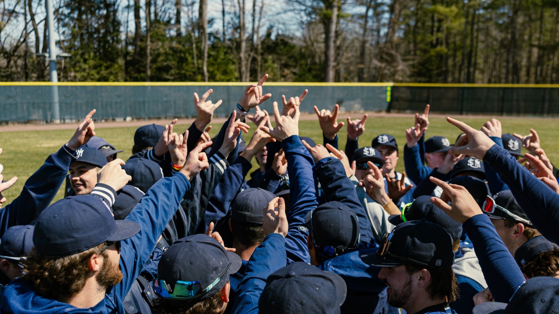 Huskies' Baseball huddles