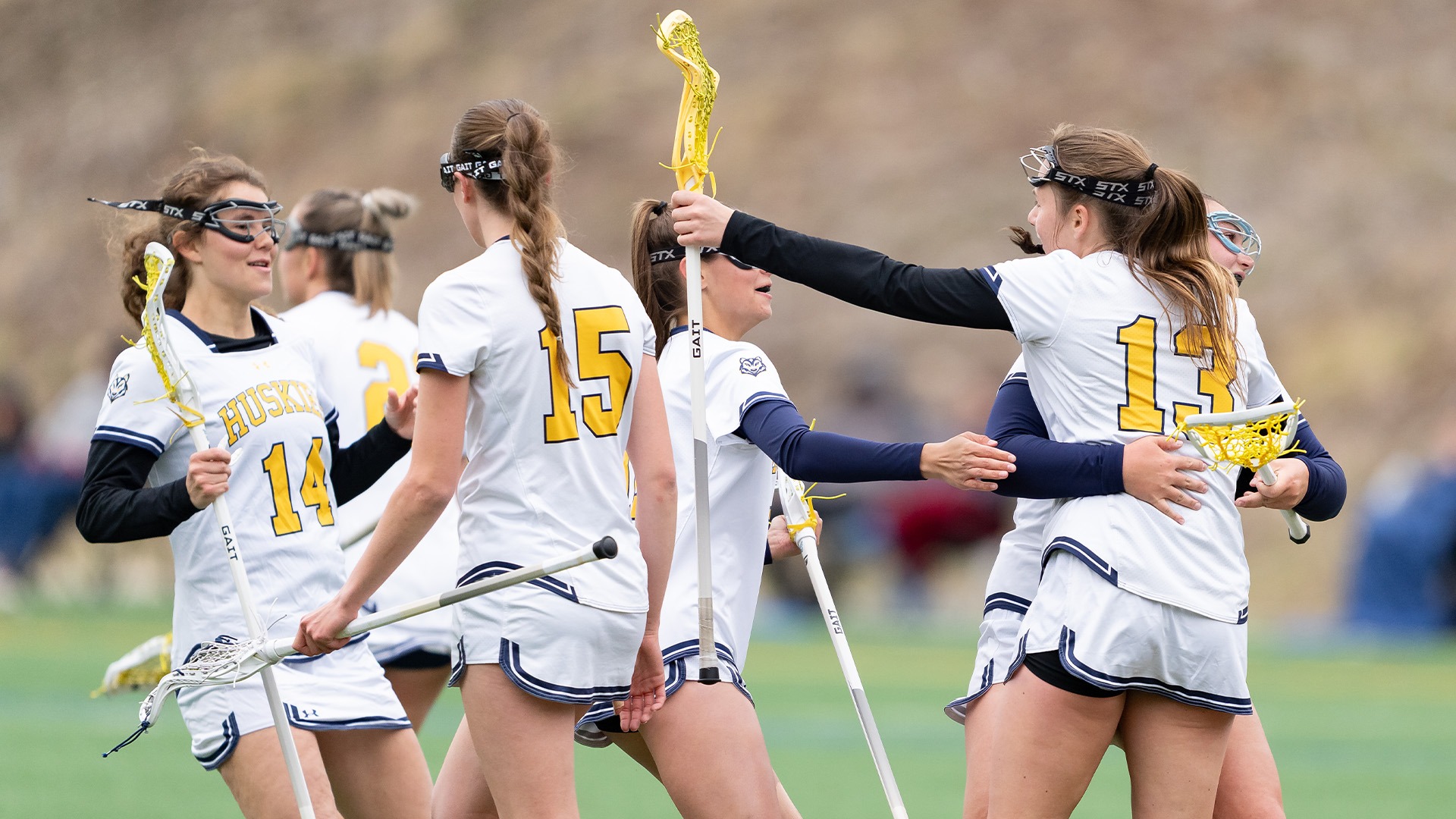 Group Huskies Celebrating a Goal by UMass. Boston
