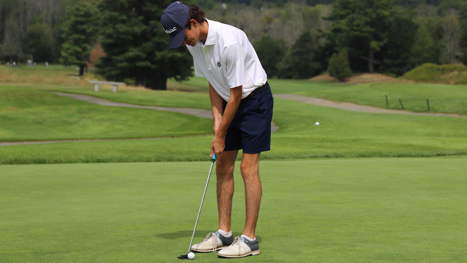 SJ Welch Practices a Putt a Riverside Golf Course