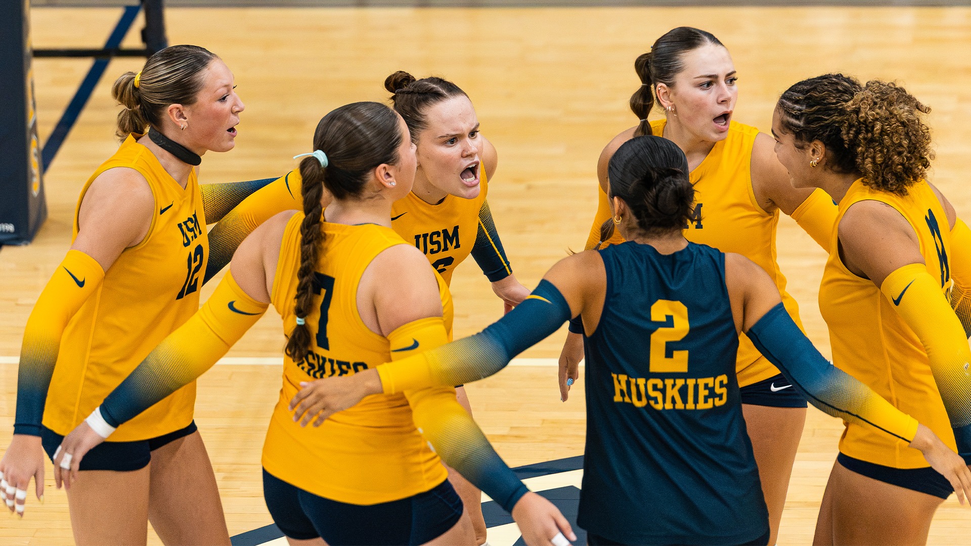 Southern Maine Women's Volleyball Celebrates in the Huddle