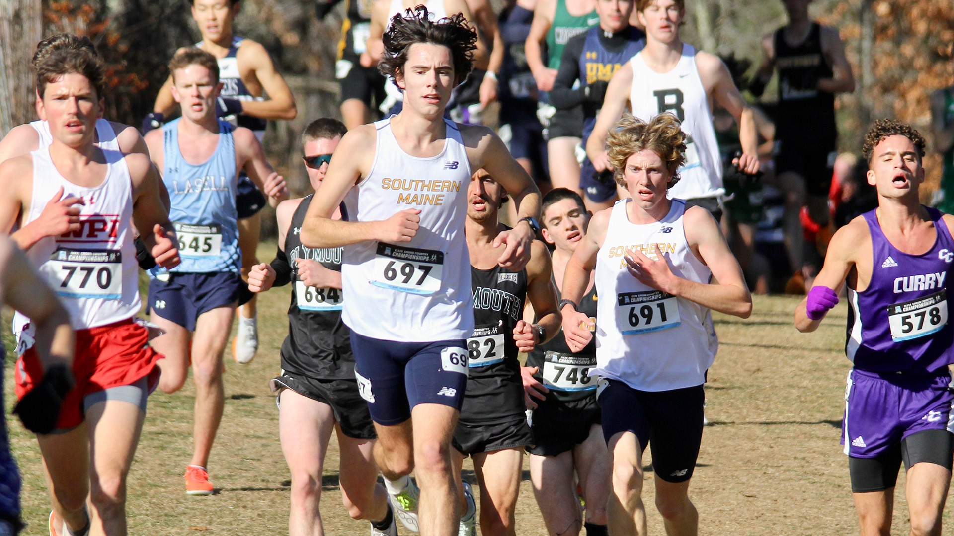 Evan Schneider and Harry Dunne Running at DIII East Regionals