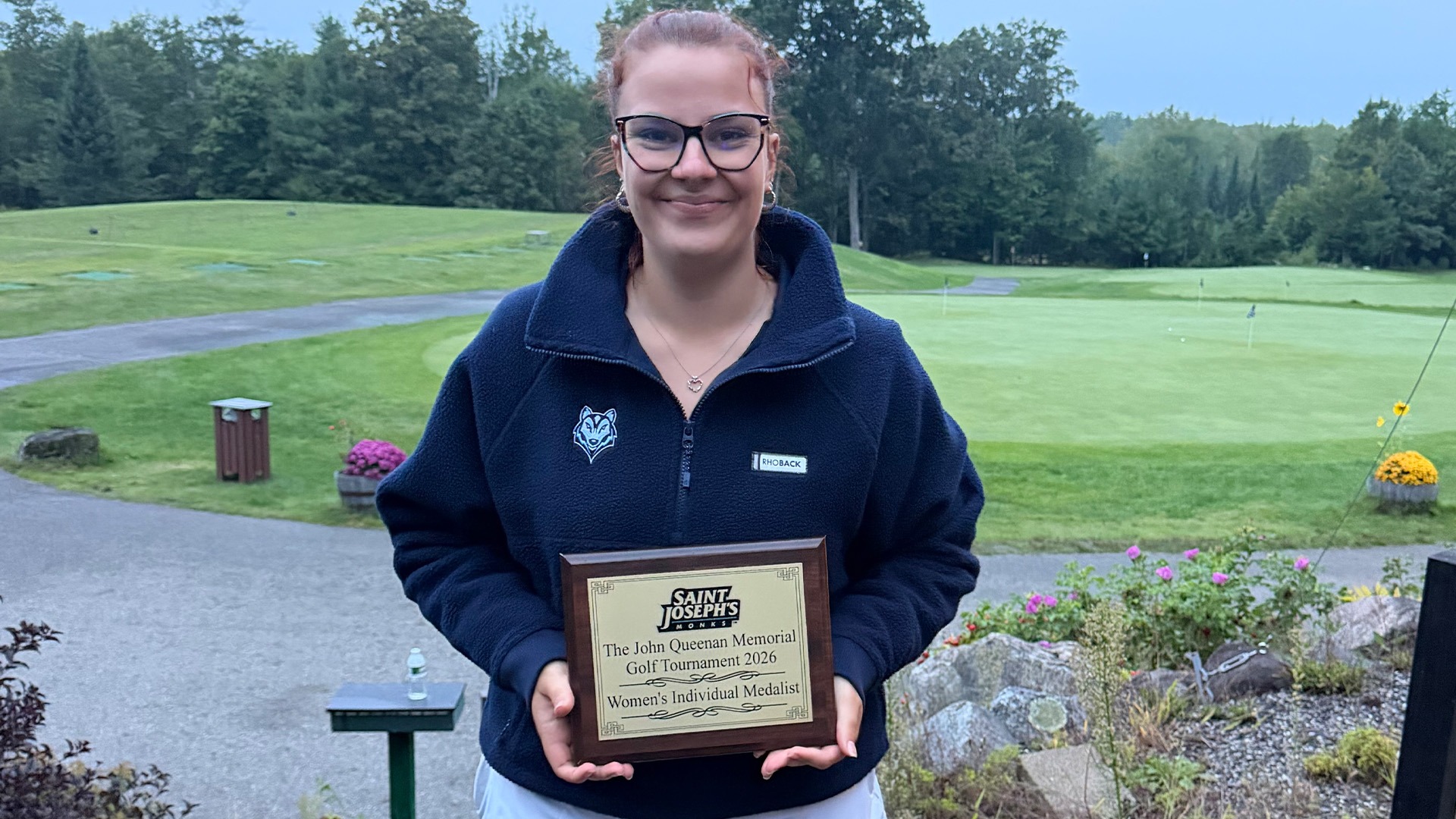 Remy Levin with John Queenan Invitational Plaque