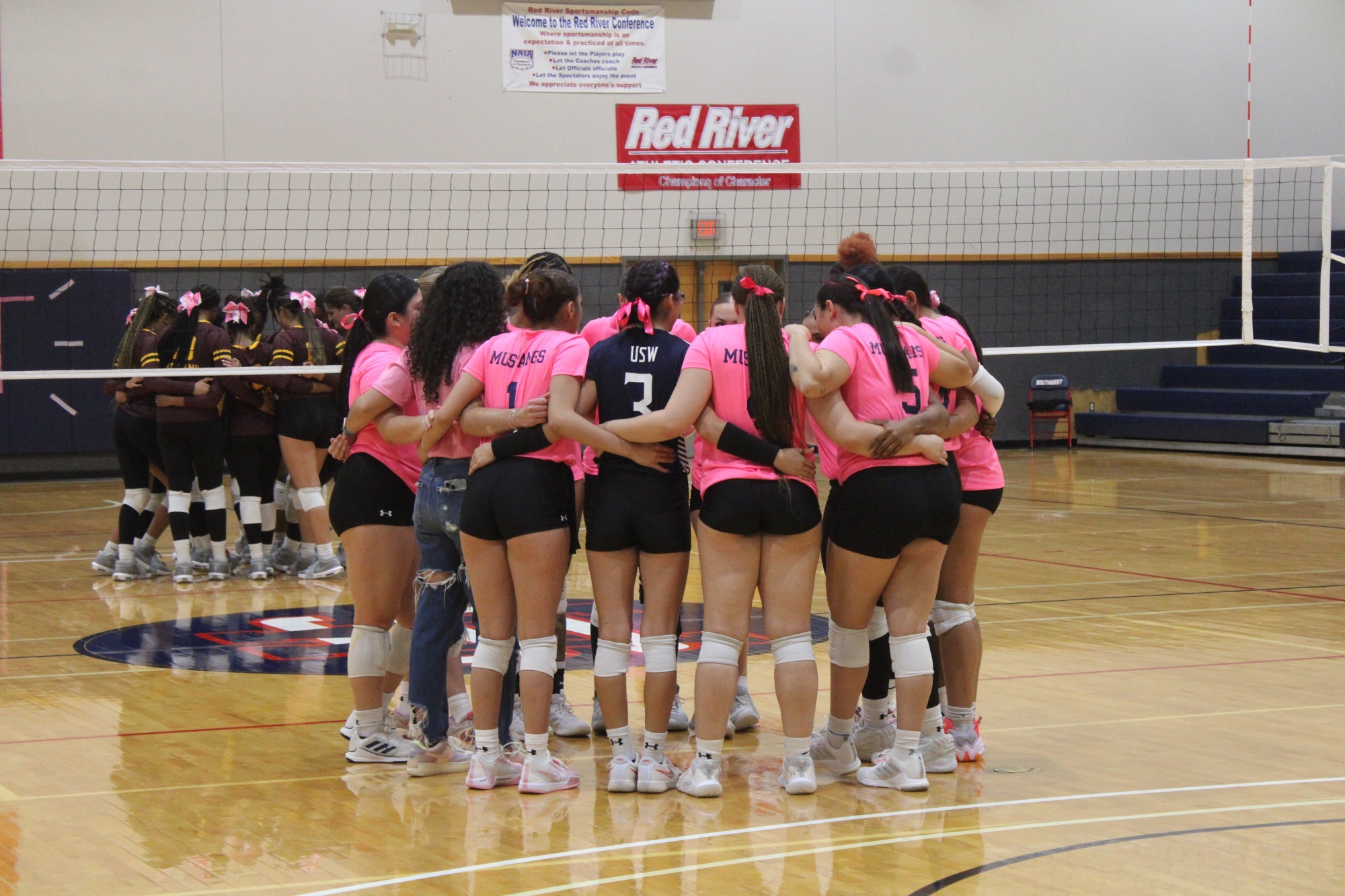 Volleyball Team huddle 
