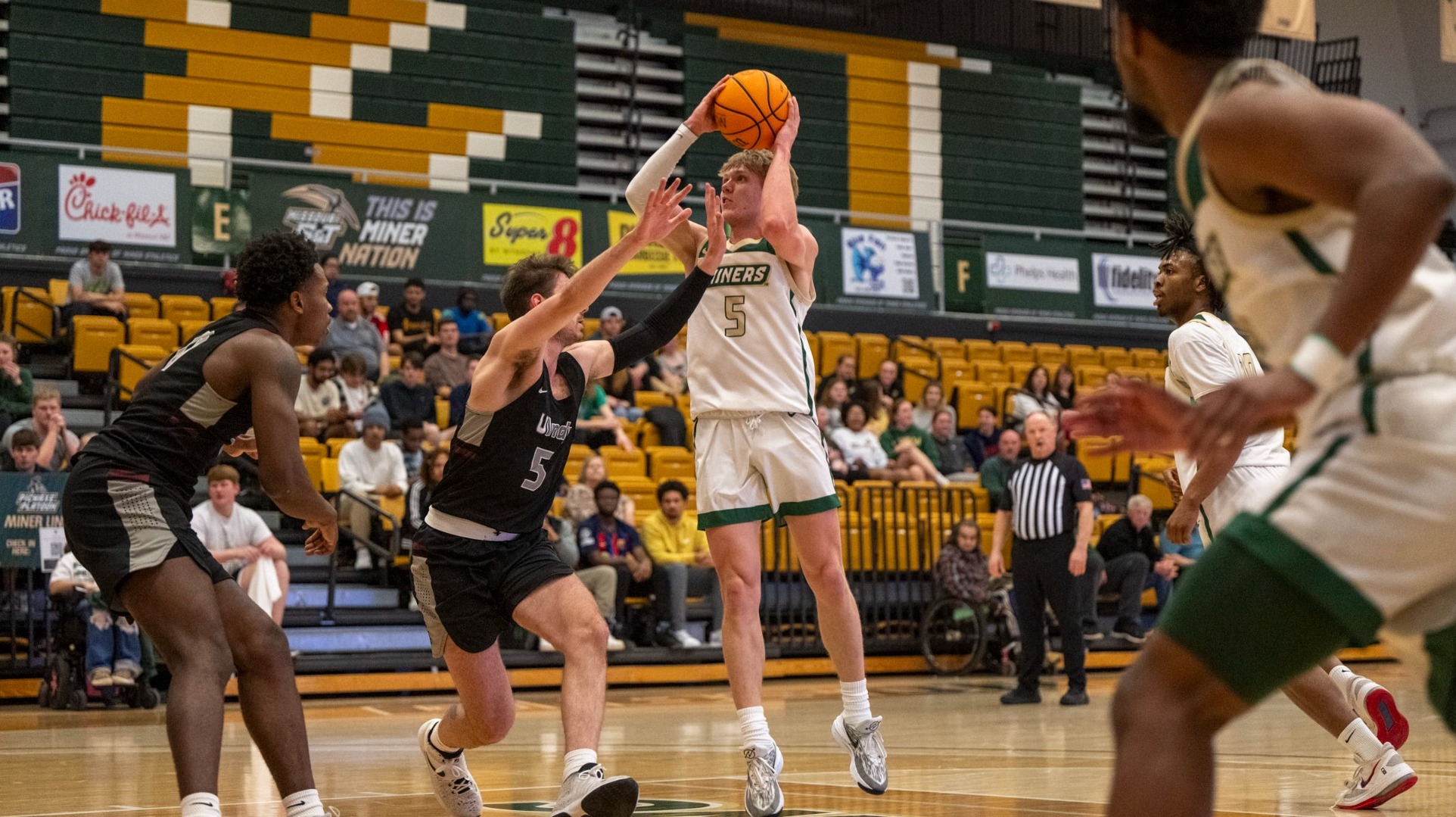 Froebe reaches 1,000 points, but Miners fall in overtime to UIndy