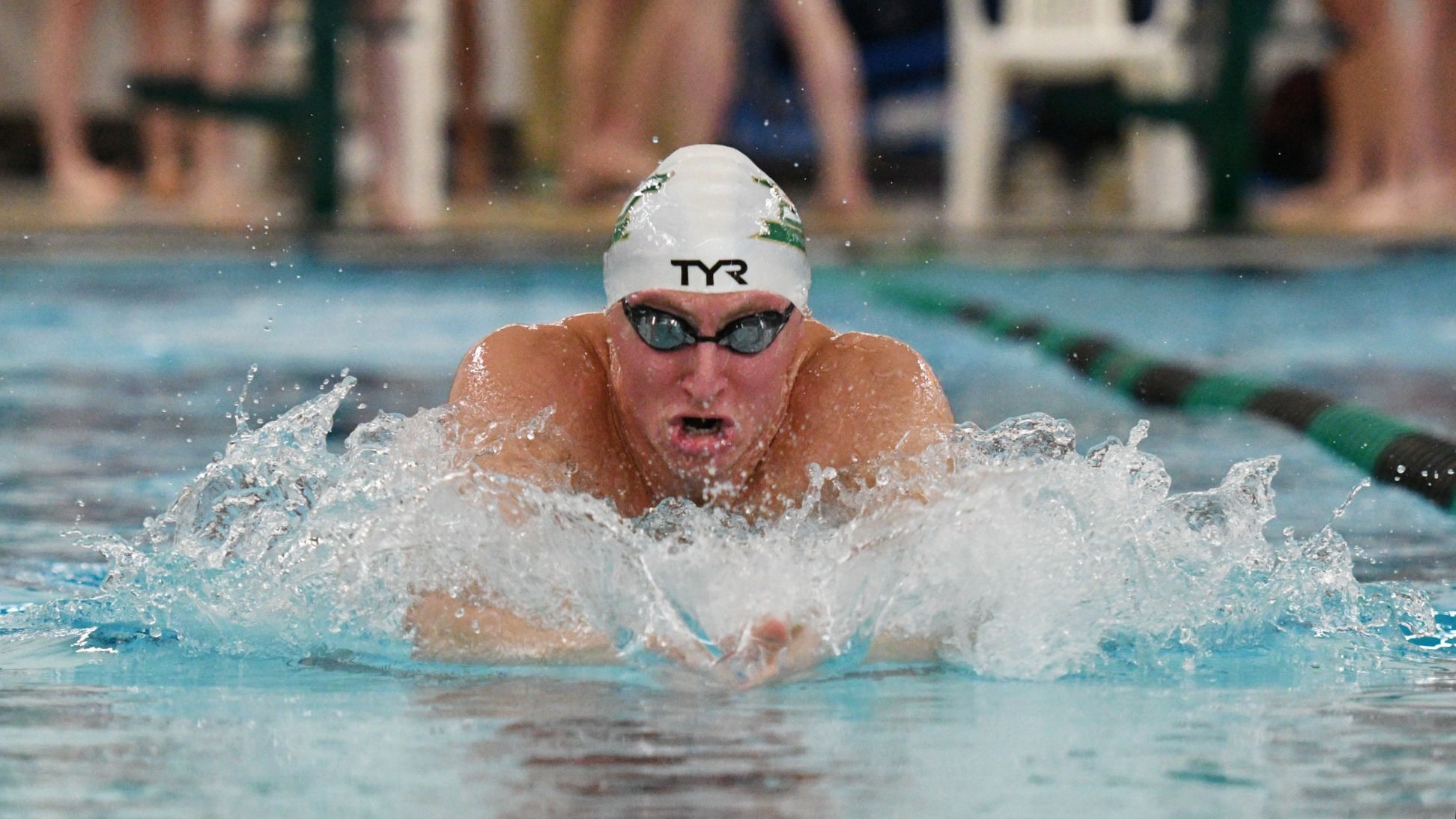 Photo of Jordan Christensen doing the breaststroke