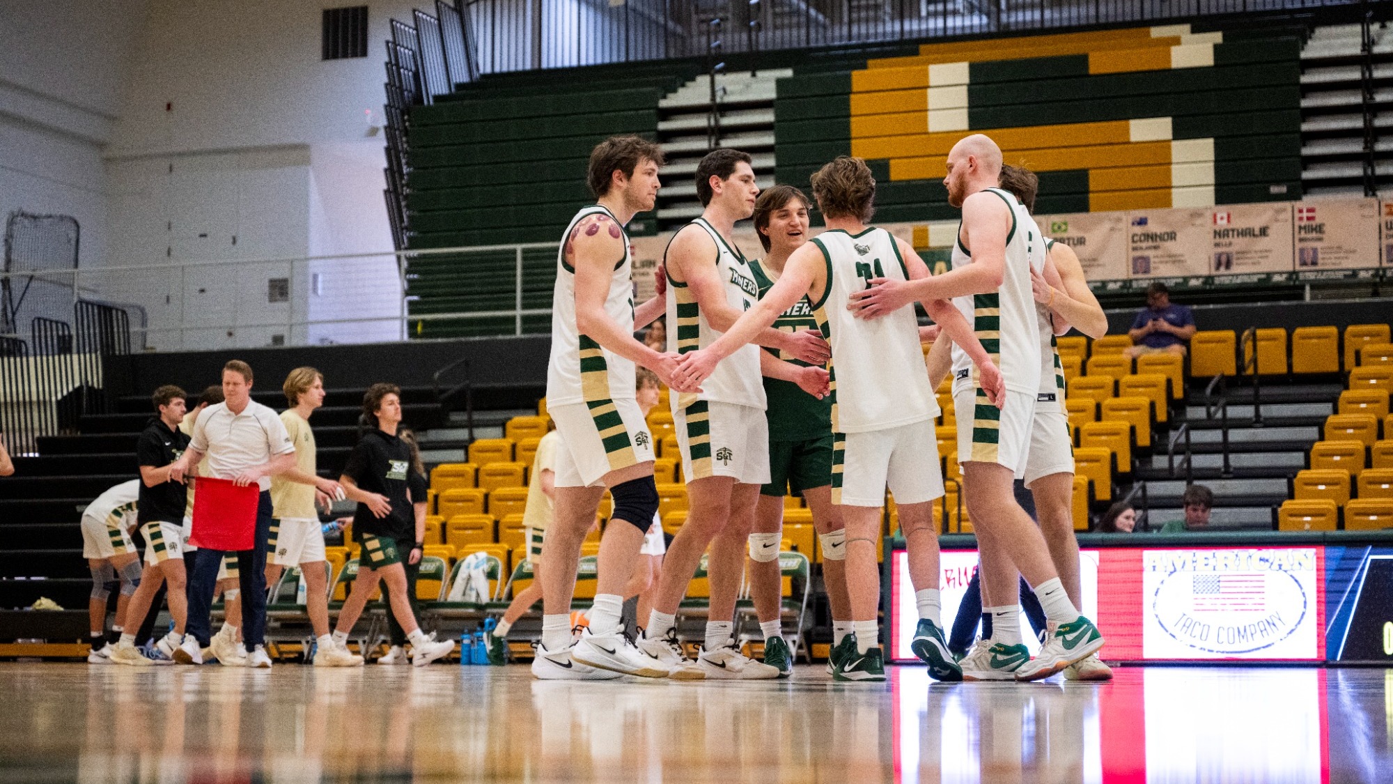 Men's Volleyball team huddle