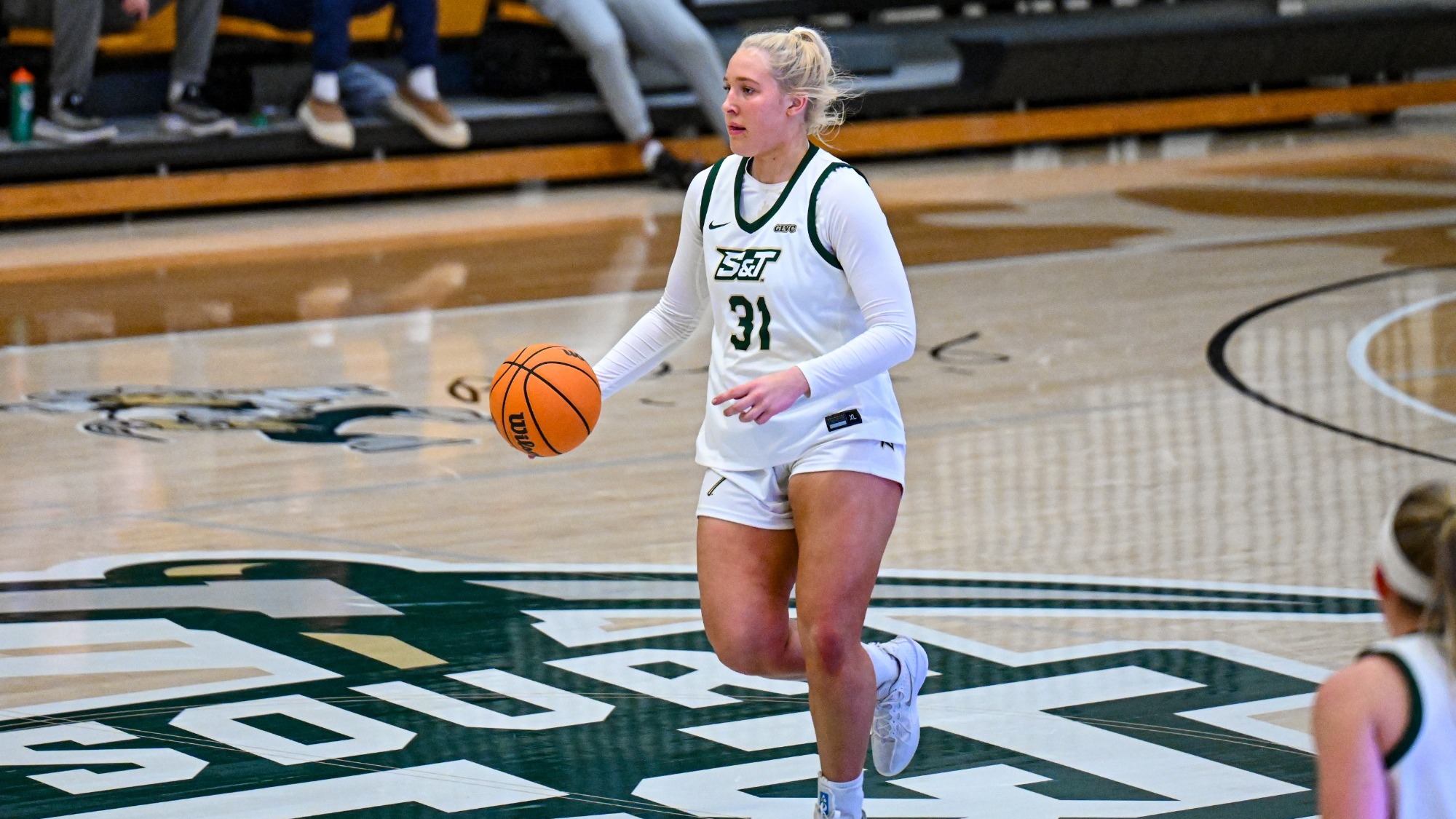 Missouri S&T forward Anna Gilbertson dribbling the ball at half court in Gibson Arena/