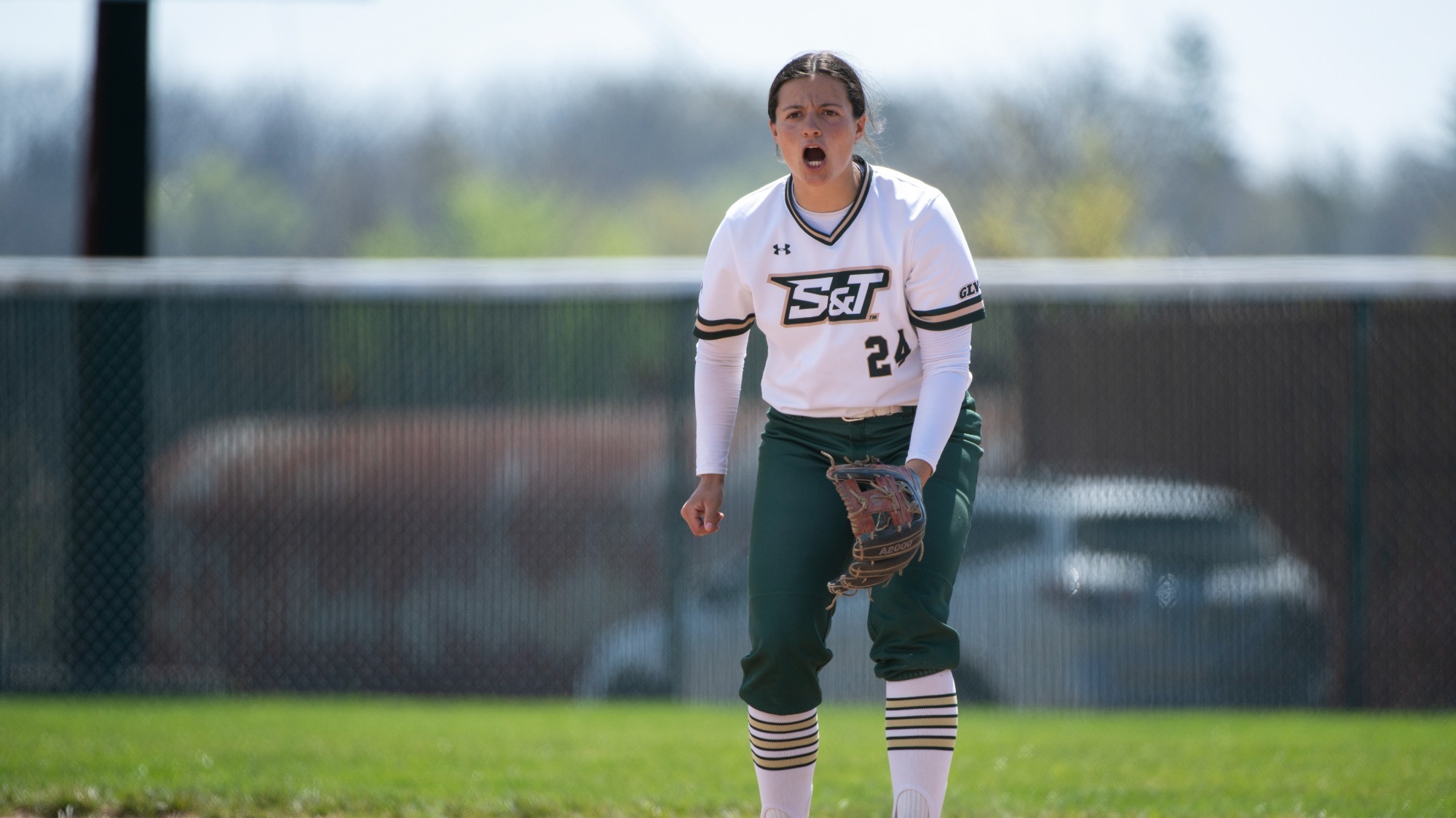 Missouri S&T Taylor Nelson on the softball field celebrating.