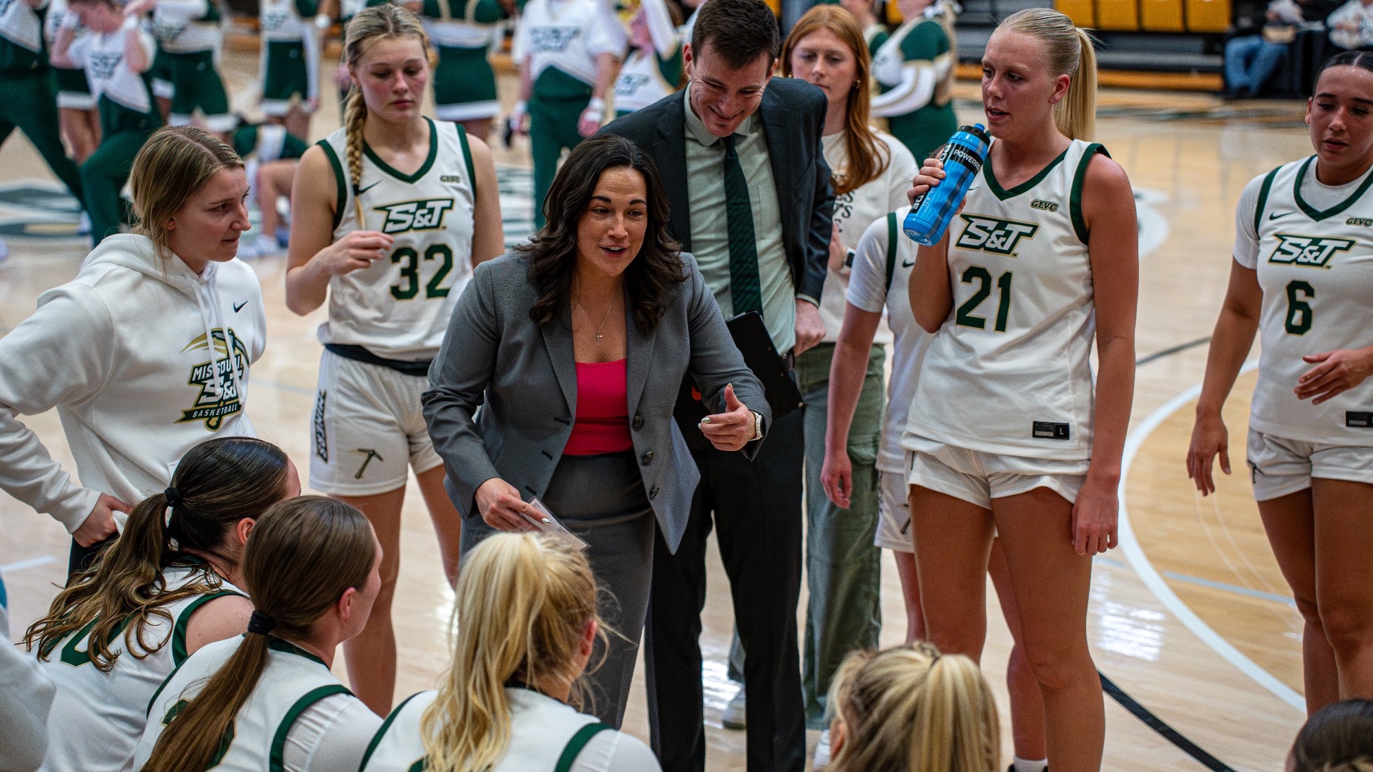 Missouri S&T women's basketball head coach Kira Carter taking to her team during a timeout in Gibson Arena.