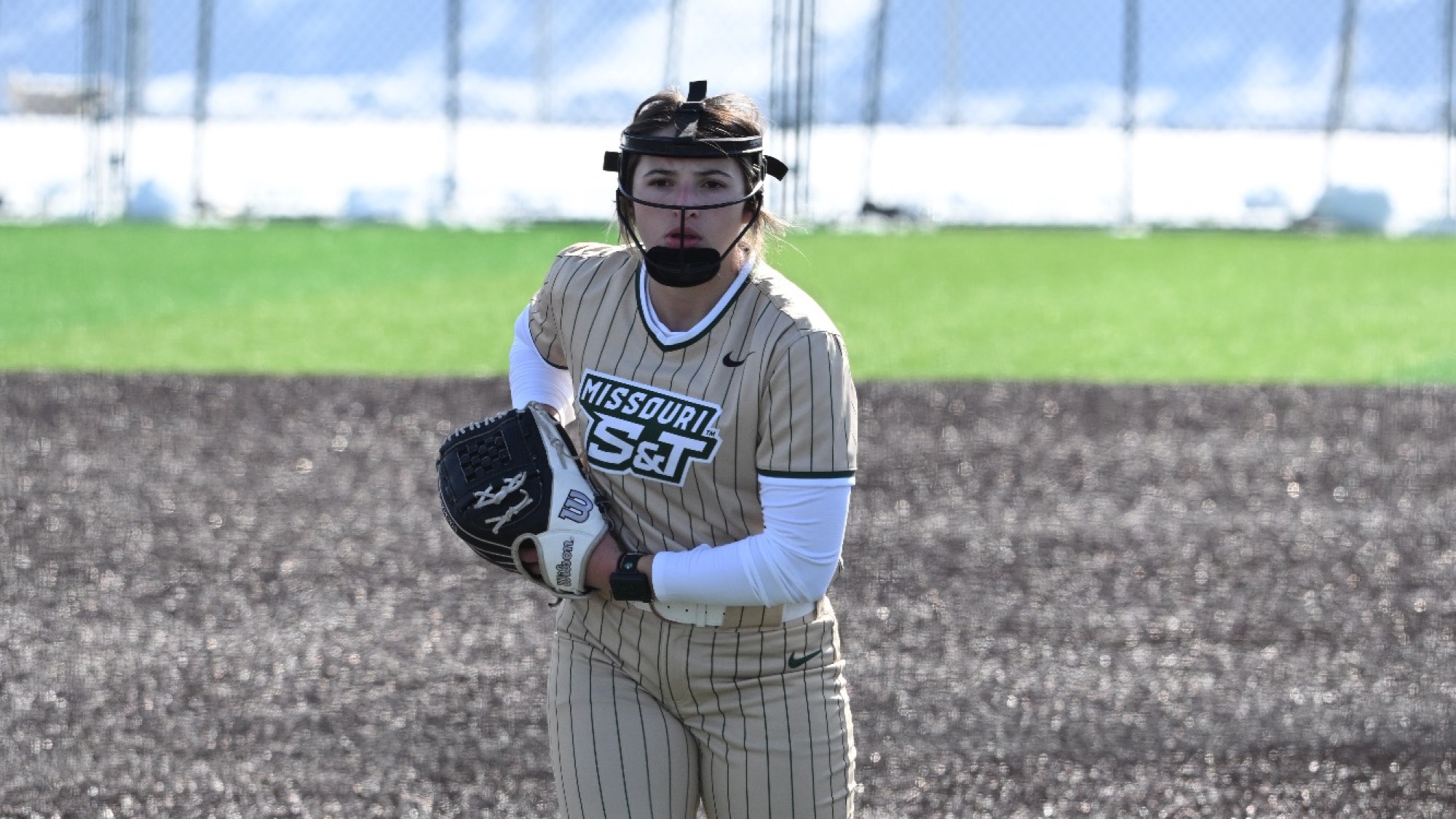 Missouri S&T softball pitcher AJ Agers on the mound getting ready to throw a pitch at the Branson Leadoff Classic