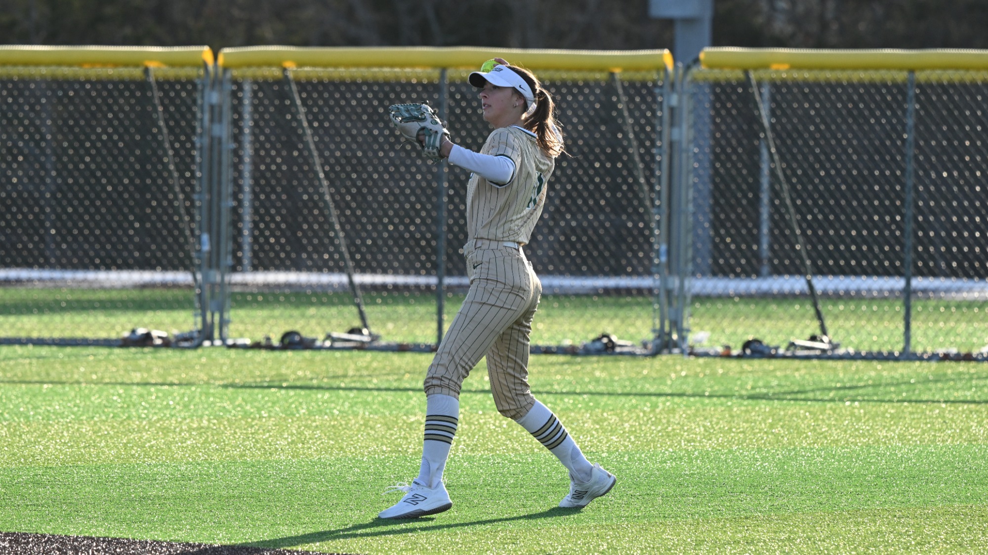 Missouri S&T outfielder Kaylee LaChappell throws the ball back into the infield during action at the Branson Lead Off Classic.