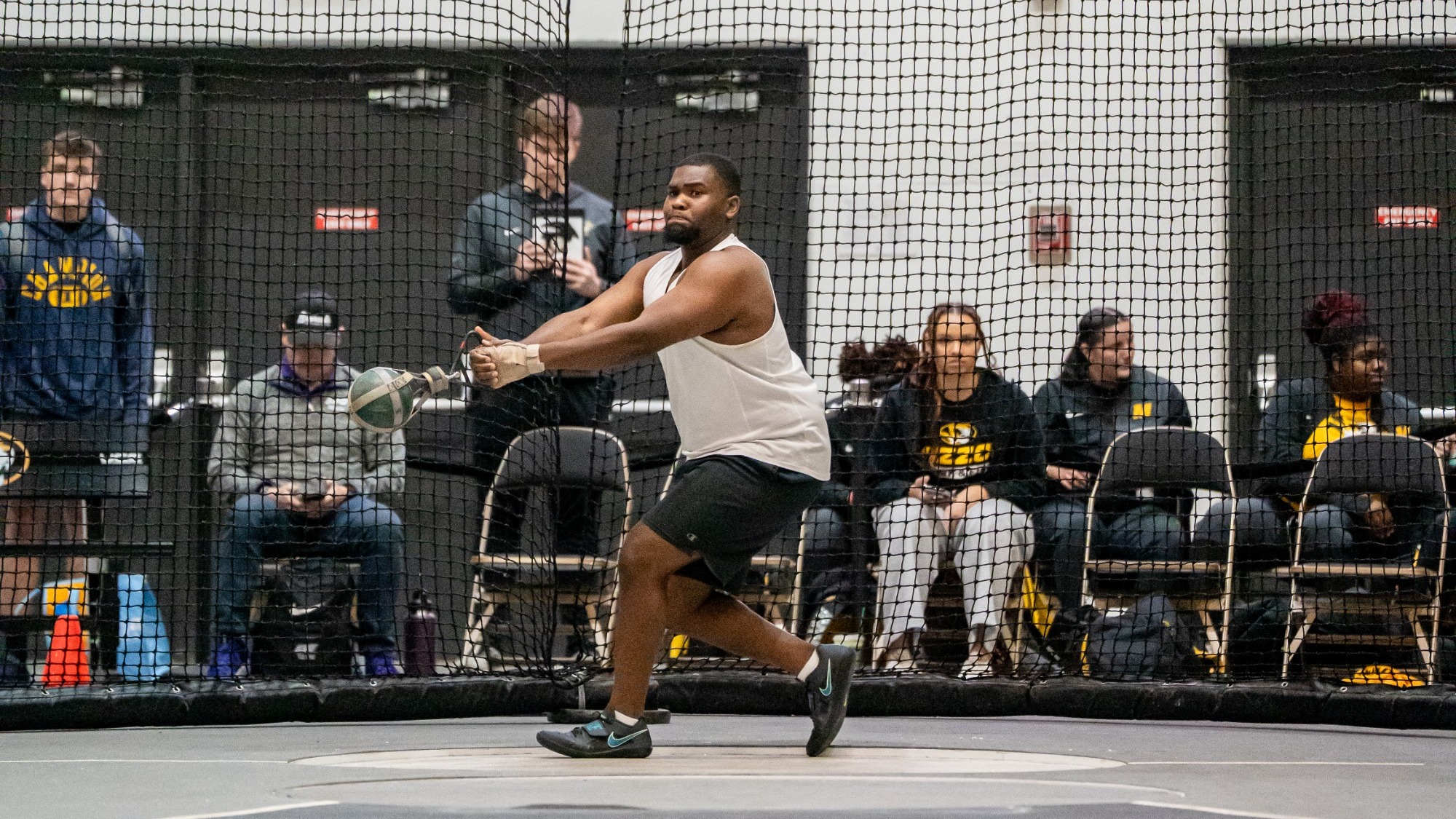 Missouri S&T thrower DJ Carter is captured mid-rotation during the weight throw at the Show Me Showdown, hosted by Mizzou.