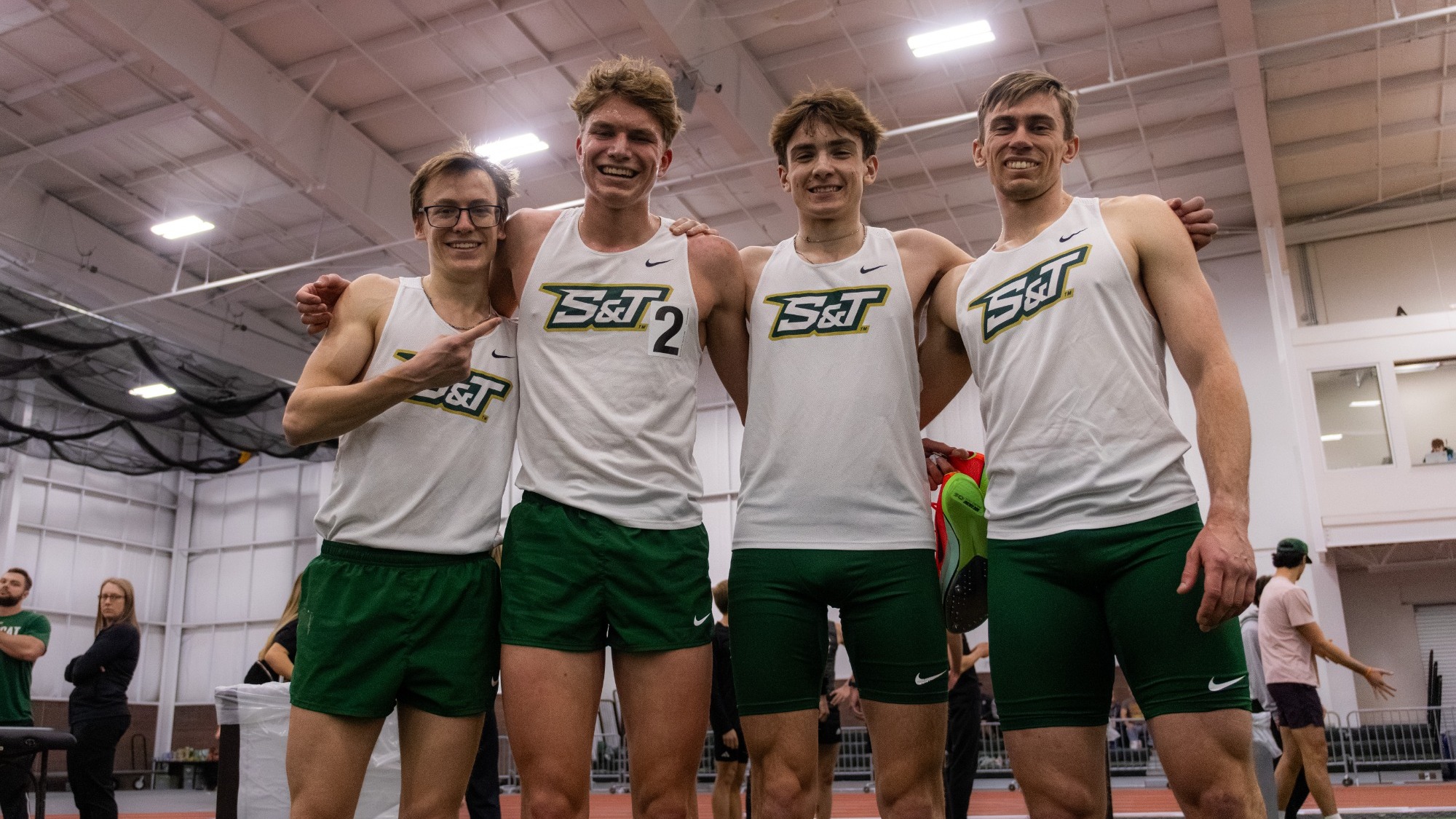 Missouri S&T track and field athletes, from left to right, Andrew Bacon, Henry Born, Jack Janovick, and Otto Knittel pose together following competition at the Bearcat Invitational.