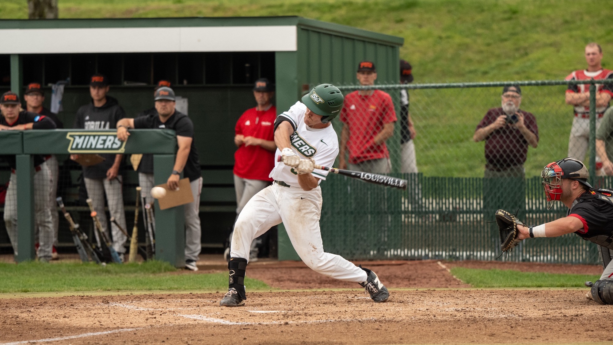 Missouri S&T baseball player Will Beckham swinging a bat at an incoming pitch during an at bat.