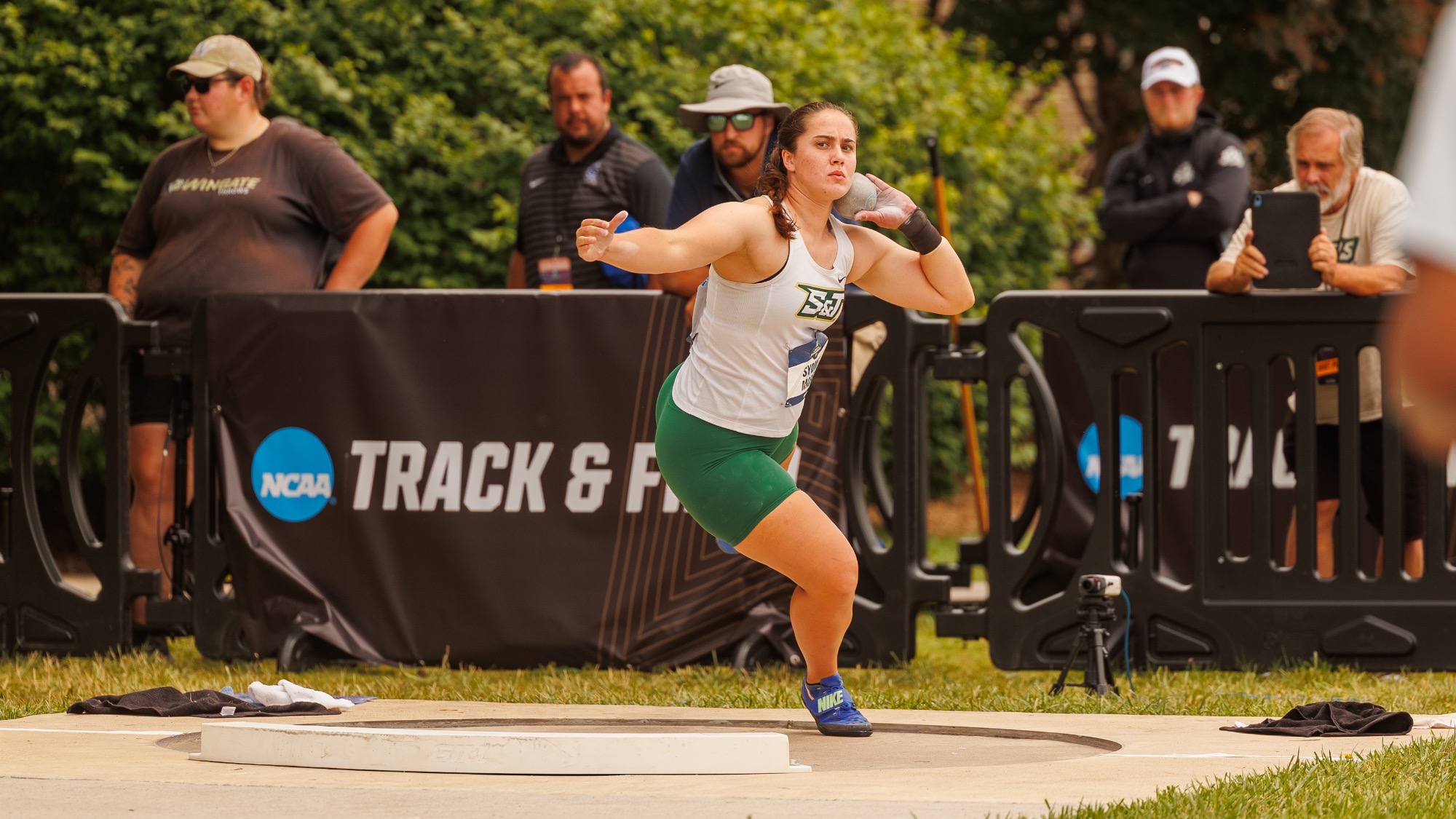 Sydney Morris or Missouri S&T track and field photographed throwing a shot during shot put at nationals at Emporia State
