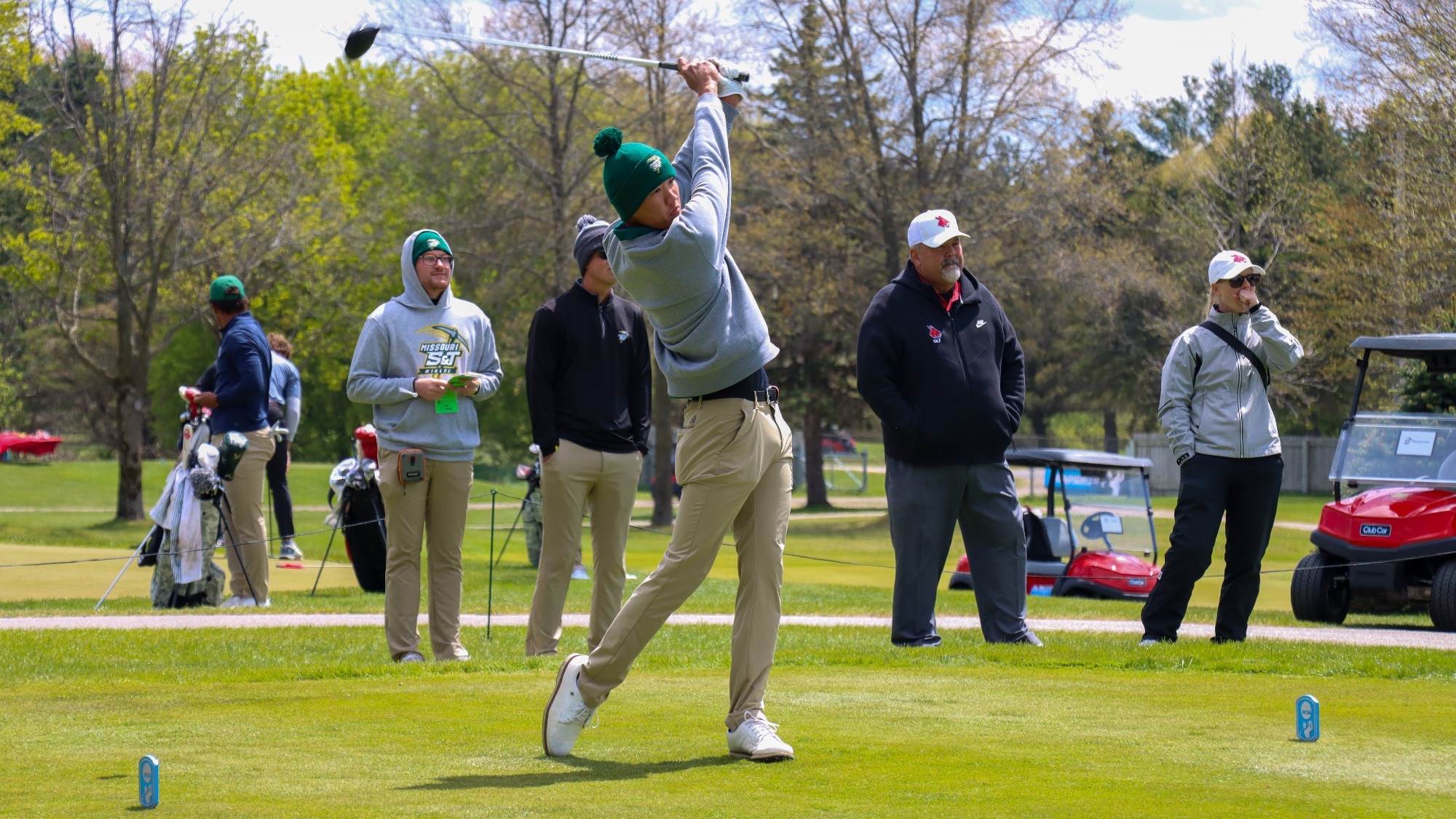 Andy Su from Missouri S&T Golf is photographed mid swing during a tee off at Katie Golf Course