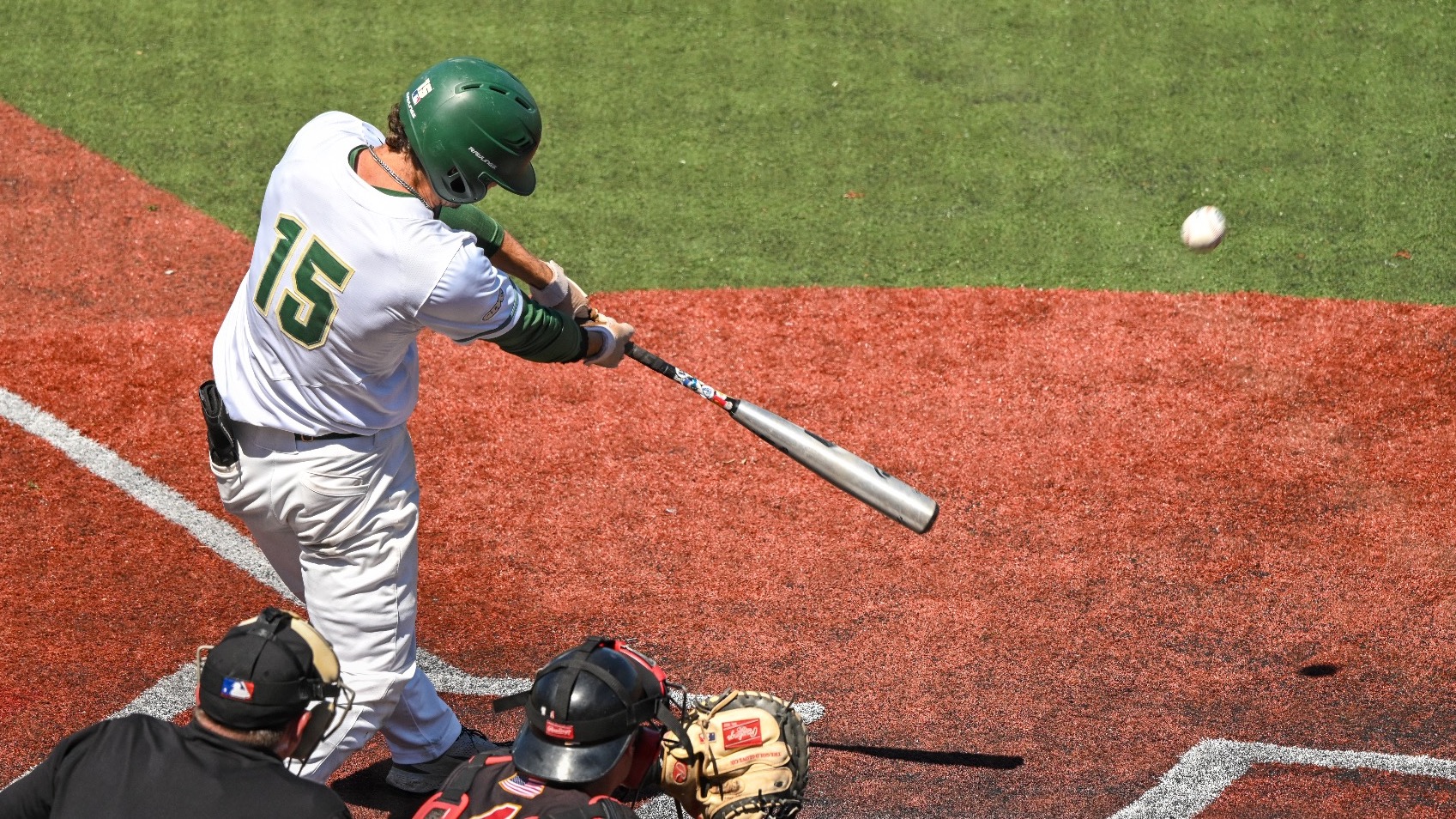 Missouri S&T baseball player Garrett Meyer is photographed swinging at a pitch during the GLVC Championship game against Missouri-St. Louis, recording the RBI that tied the program’s single-season RBI record.