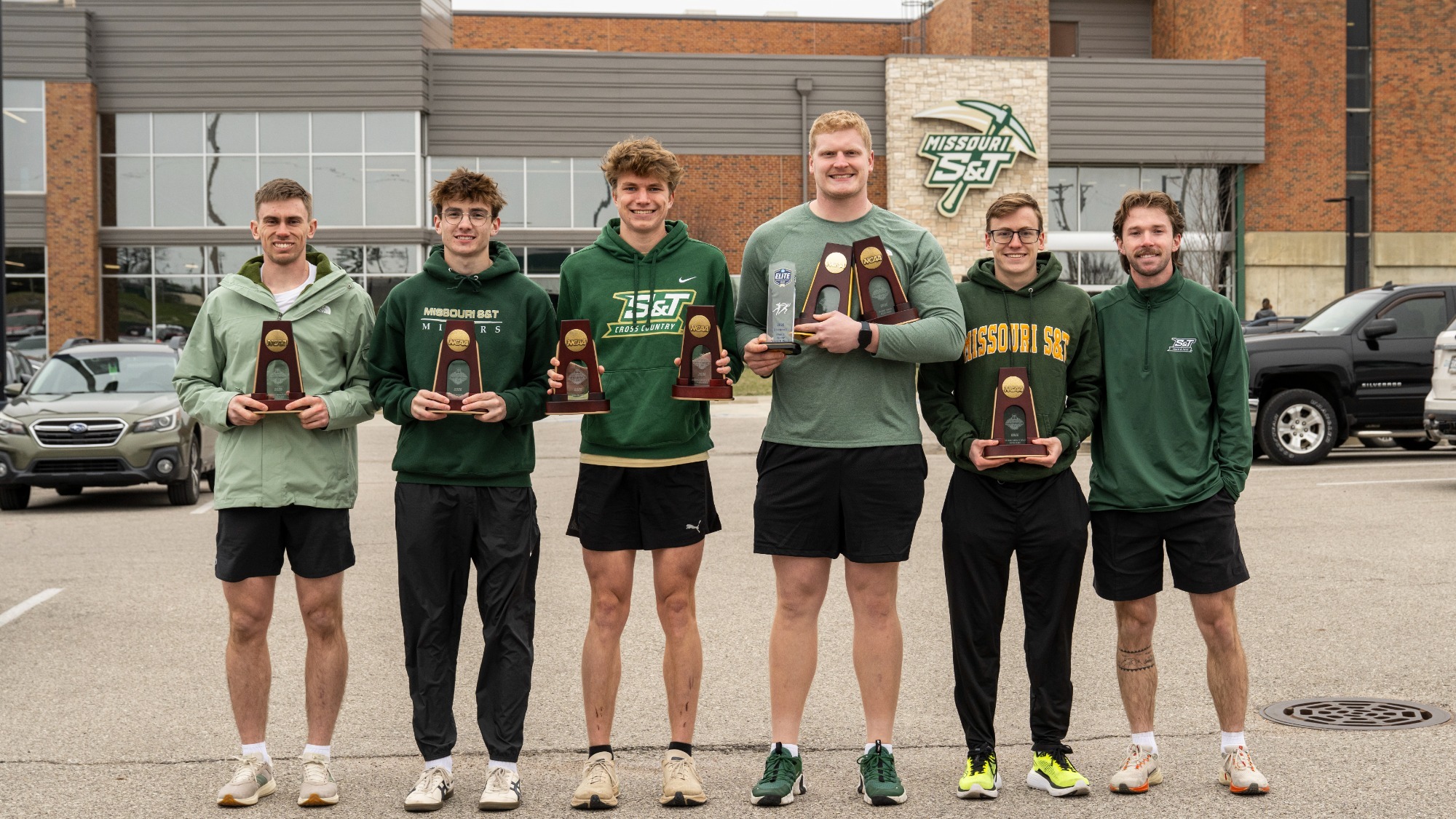(from left to right) Knittel, Janovick, Born, Fraser, Bacon, and Grellner of Missouri S&T Men's Track and Field photographed holding their trophies from the 2026 NCAA Indoor Track and Field Championships