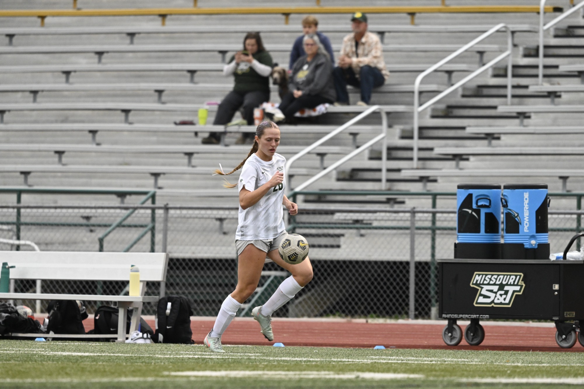Adriana Benassi runs with the ball during a game at the S&T soccer field.