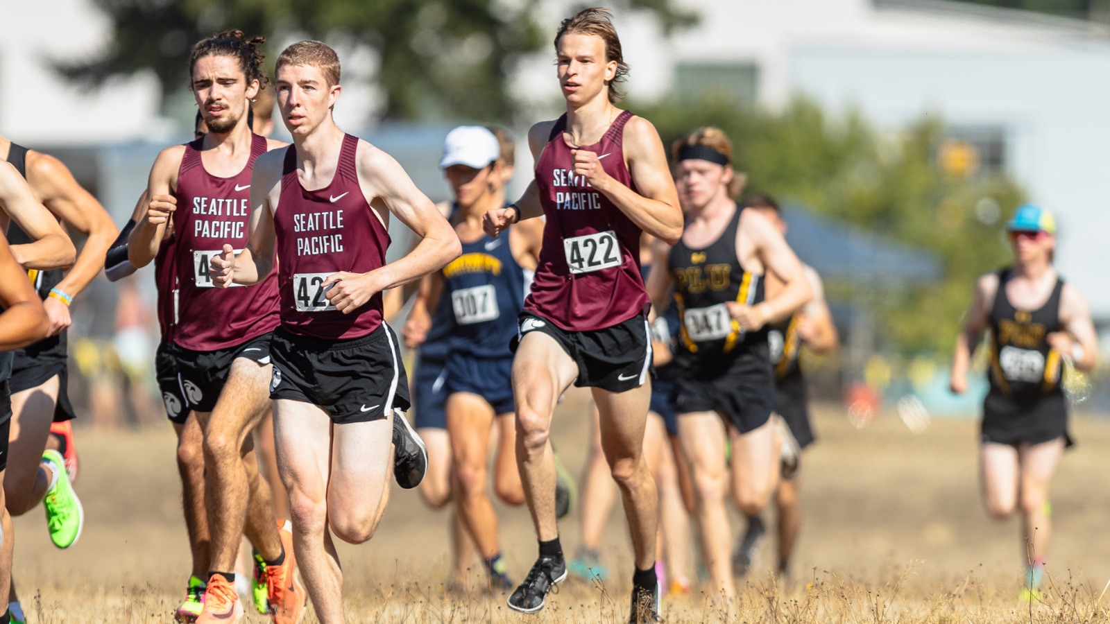 (L-R) Nathaniel Gale, Isaac Venable, and Silas Demmert take off from the start line at the PLU Invitational.