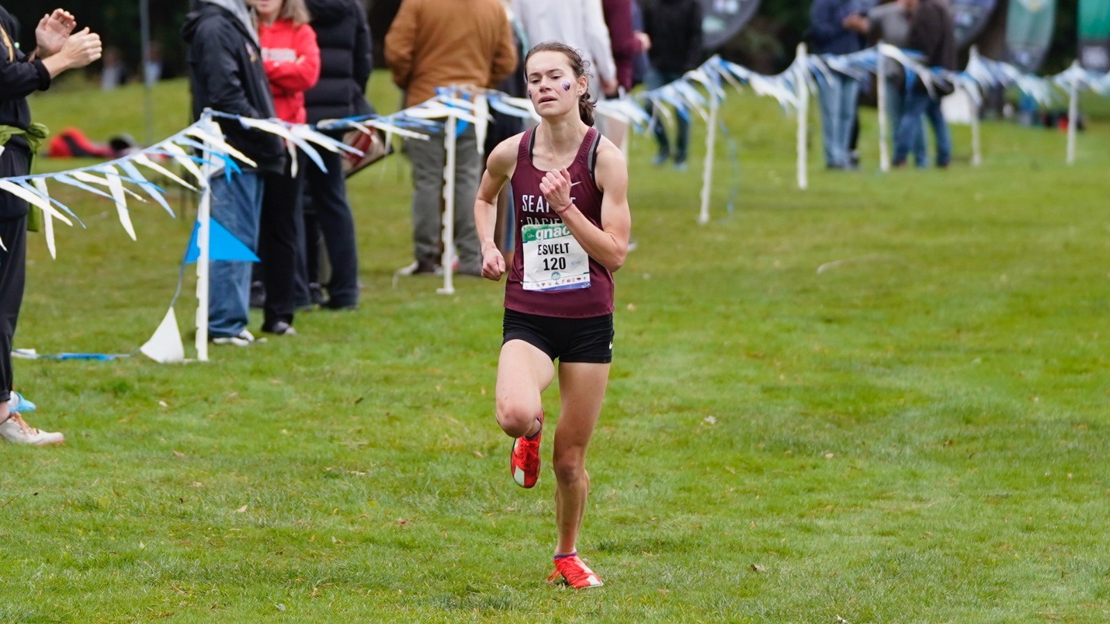 Annika Esvelt surges toward the finish line at the GNAC Championships.