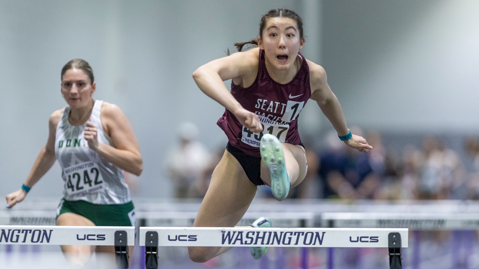 Hannah Chang in action during the 60-meter hurdles finals at the Husky Classic.