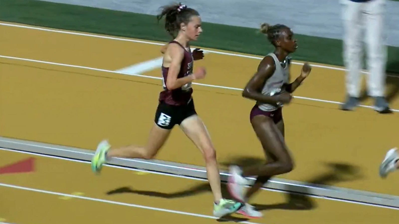 Annika Esvelt and Florence Uwajeneza head into the bell lap of the NCAA 10K.