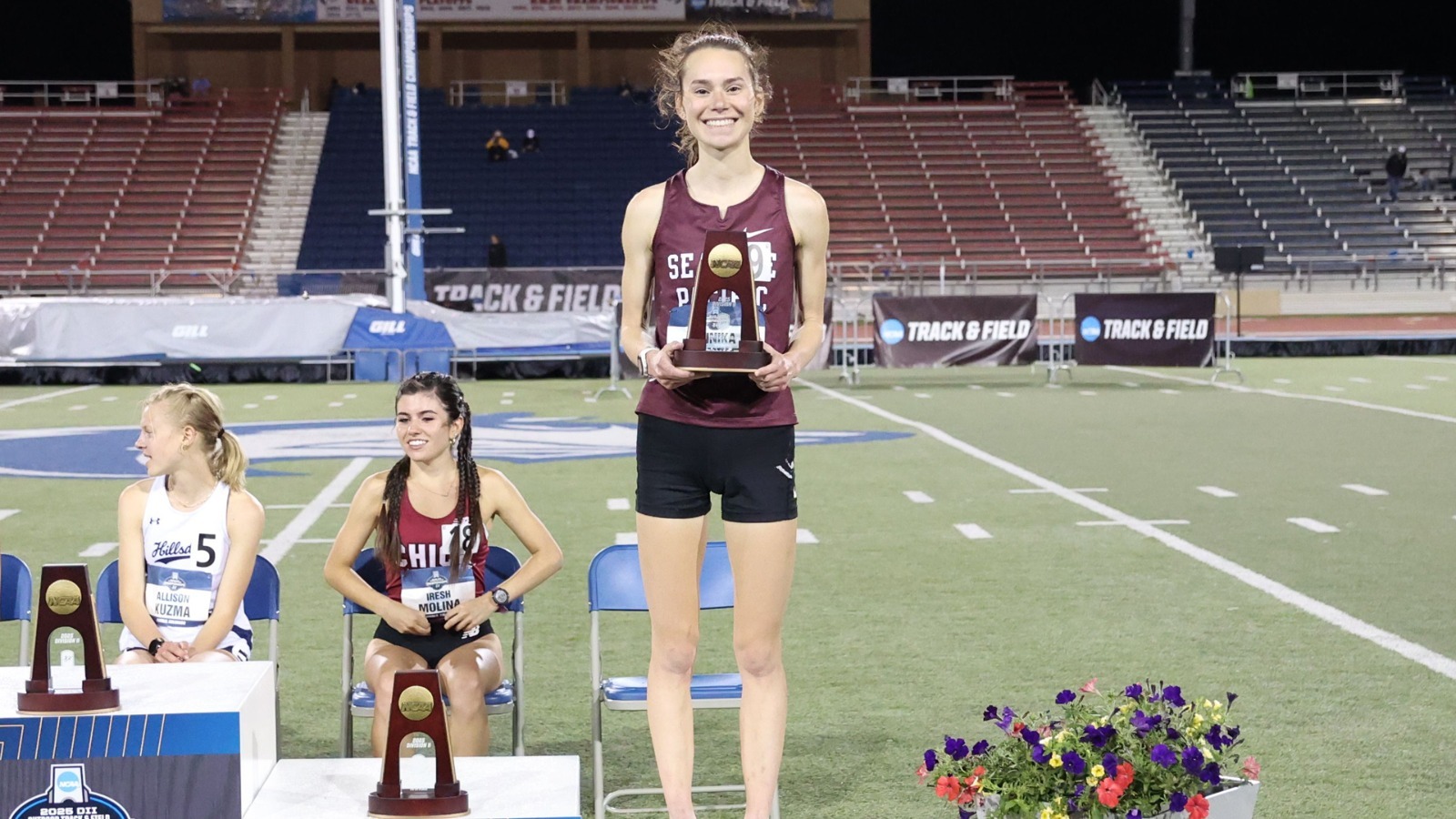 Annika Esvelt on the podium with her 7th-place trophy.