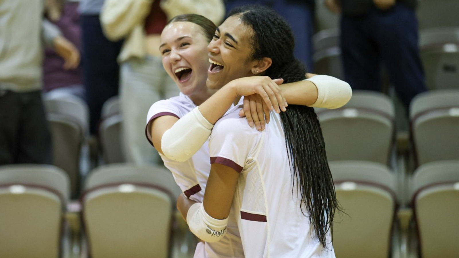 Makayla Hickman (left) and Amaya Evans celebrate after SPU's 3-0 victory against No. 18 Simon Fraser.
