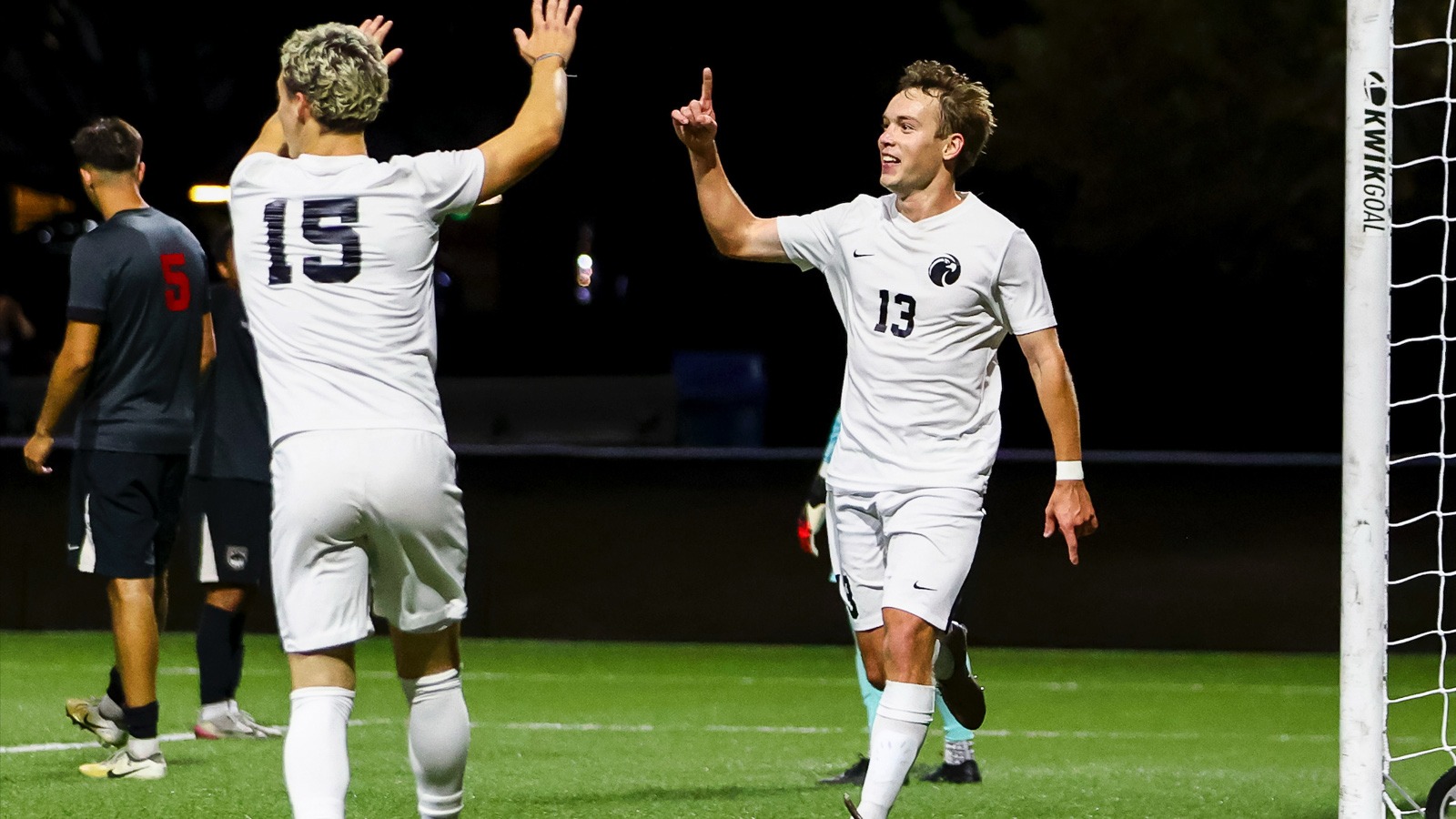 Isaac Ketcham (right) and Cooper Schneider celebrates after Ketcham's second-half goal.
