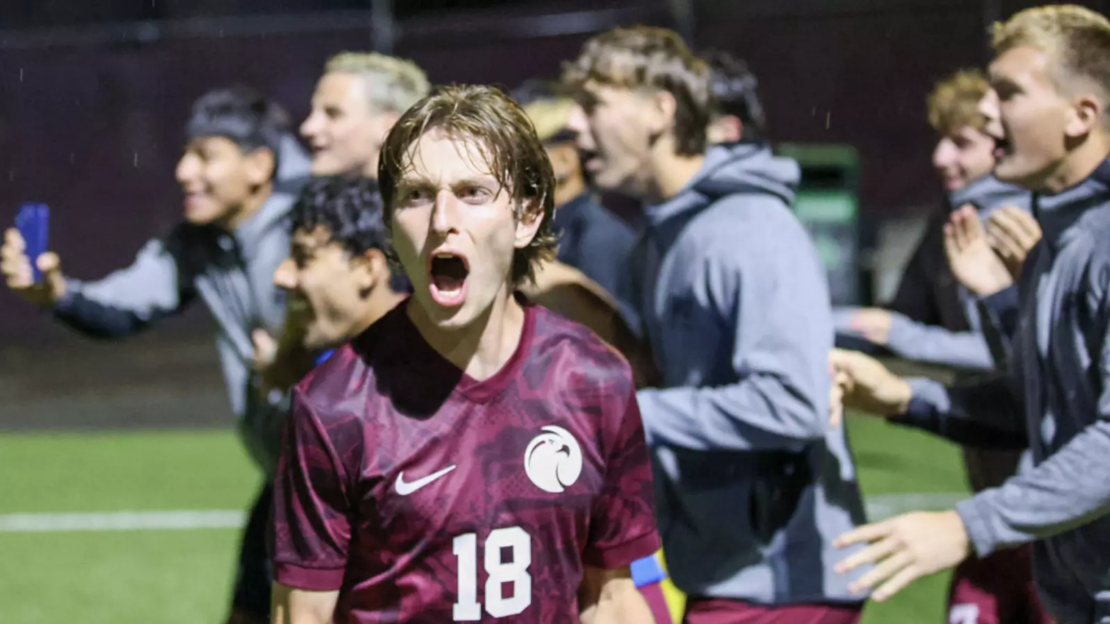 Owen Swartout celebrates after the win against PLNU.