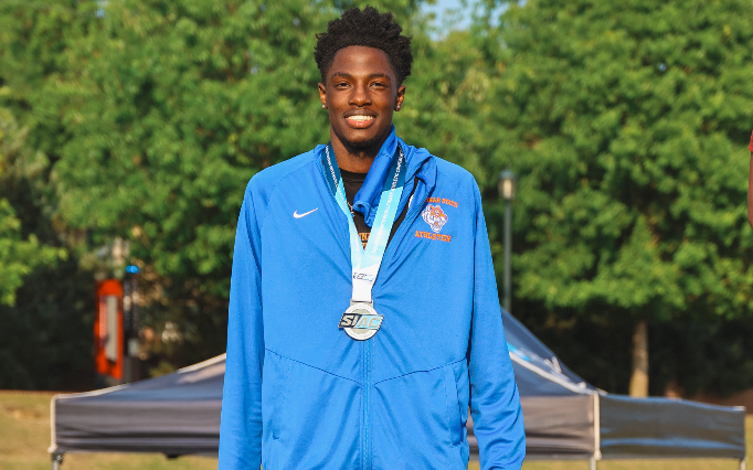 Mobley Receiving Medal At SIAC Championships '26