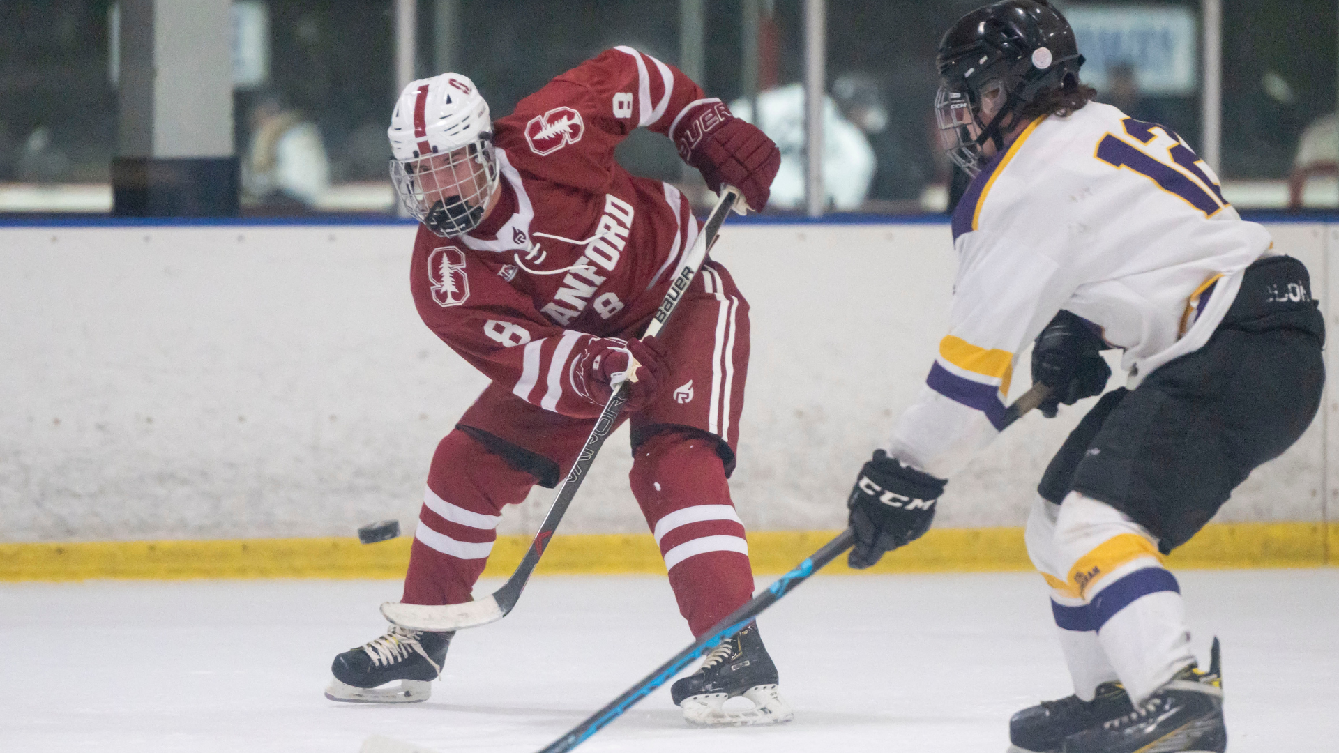 Thomas Sitzmann sauces a pass to Taden Horse in his first game for Cardinal Ice Hockey
