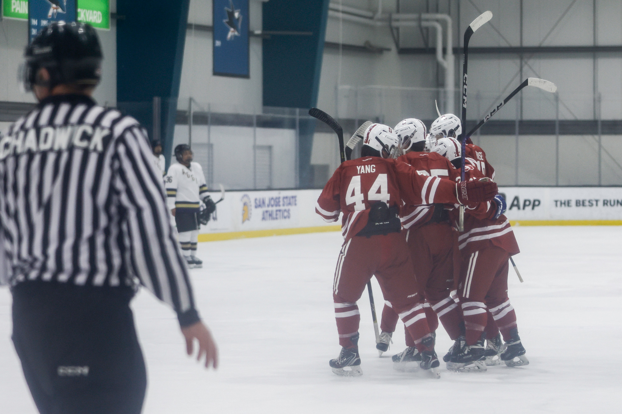 Stanford ice hockey team huddling together after goal at UC Davis Game on Feb 03, 2024