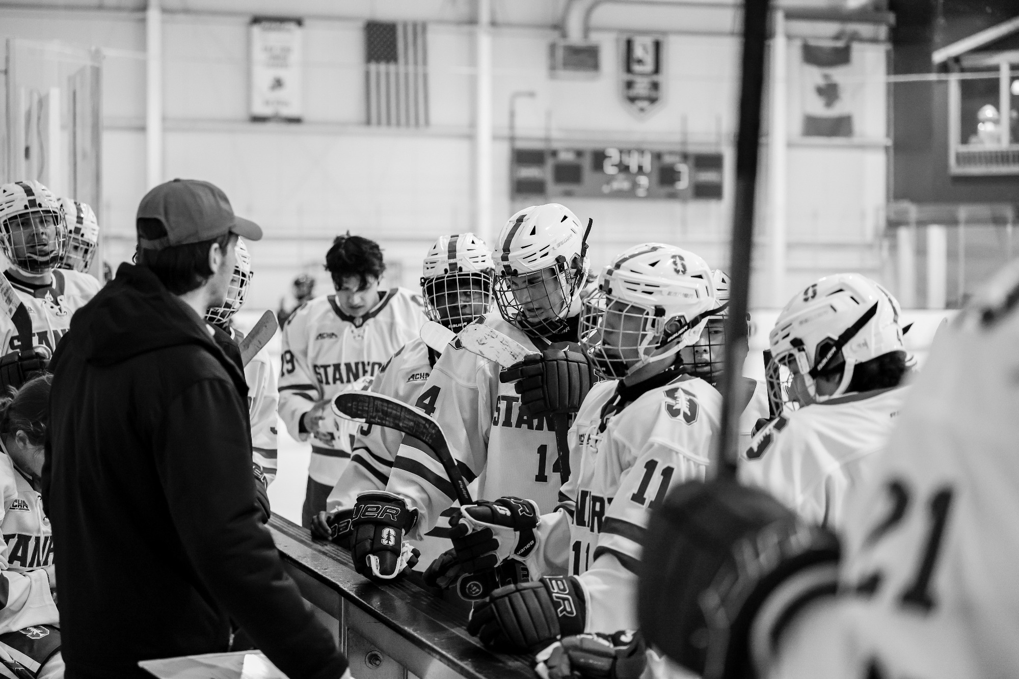 Max Rosenthal gives a quick strategy meeting during a time out.