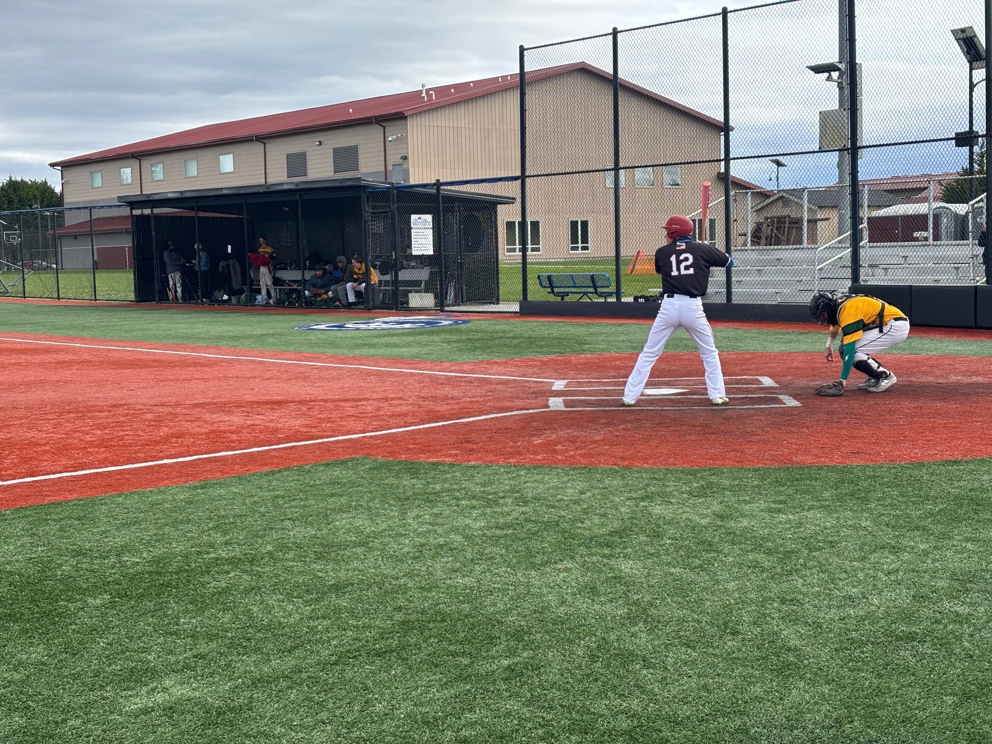 Thomas Ravel stands in for an at-bat against Cal Poly - Humboldt