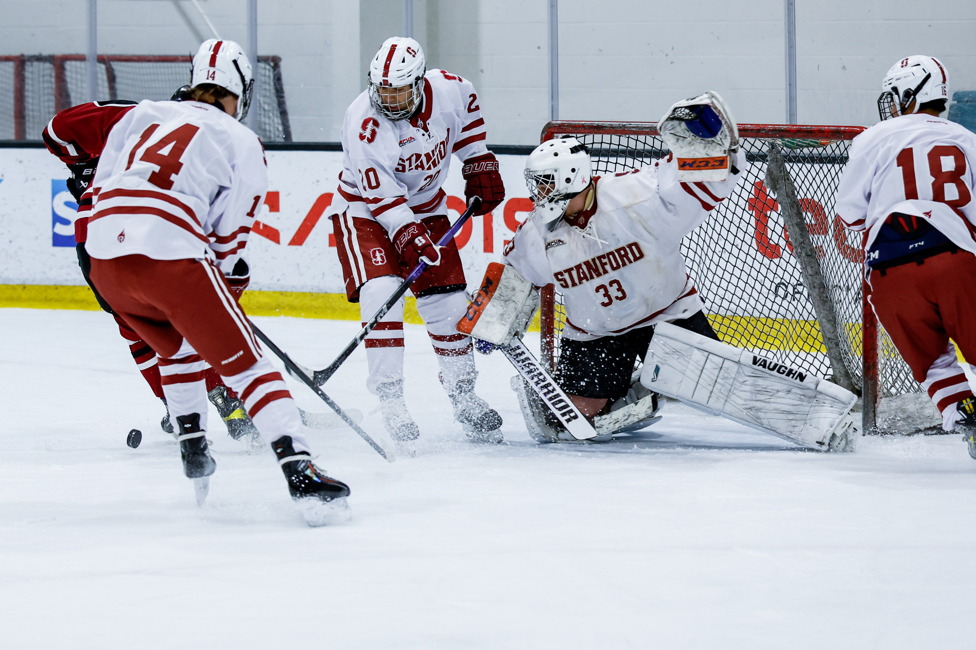 Cam Pennington saves a shot