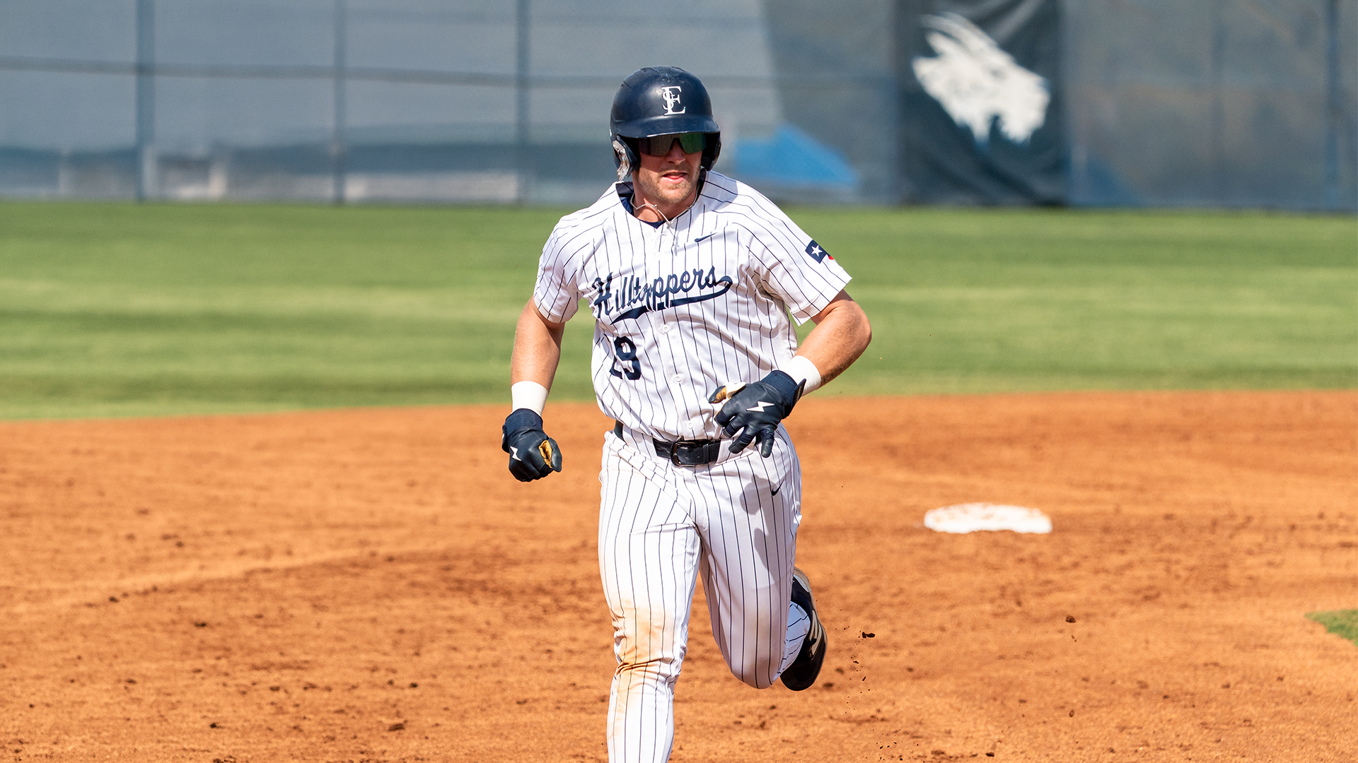 Connor Cox rounds second
