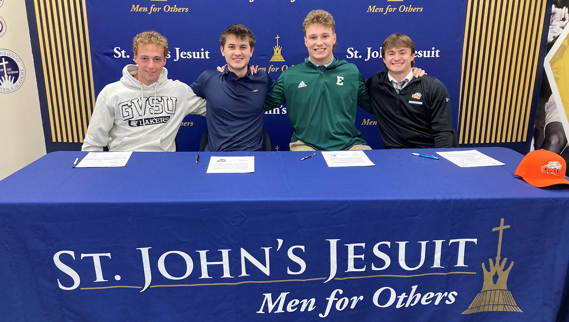 Four Titans participate in Signing Day! St. John's Jesuit Titans