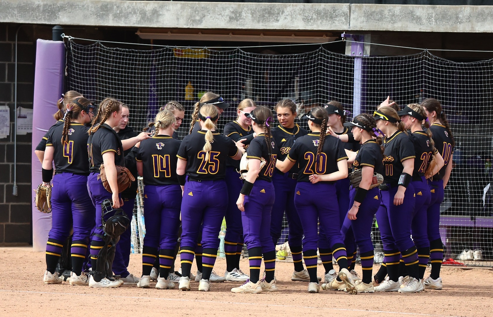 Softball team huddle