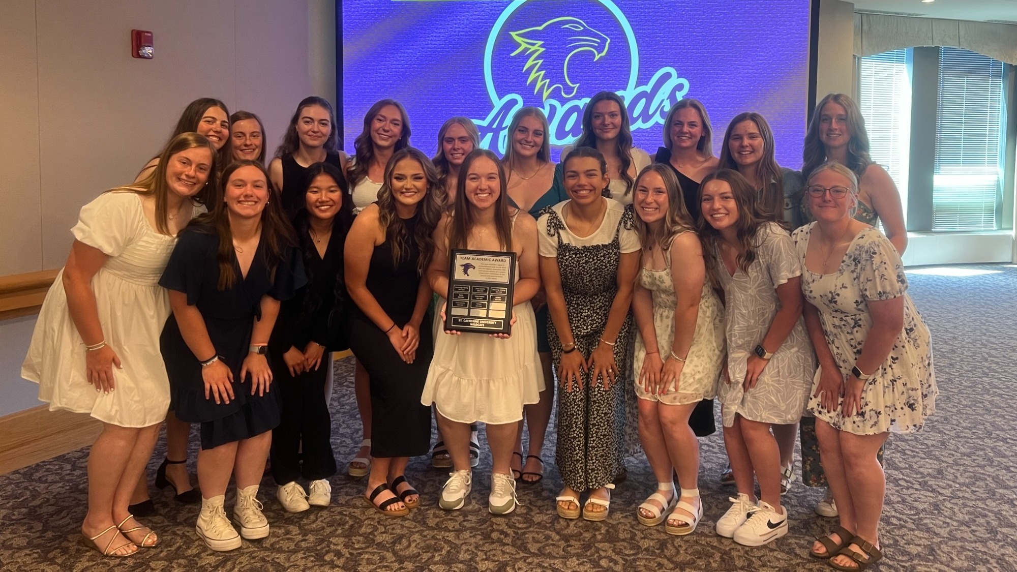 Softball team at award ceremony