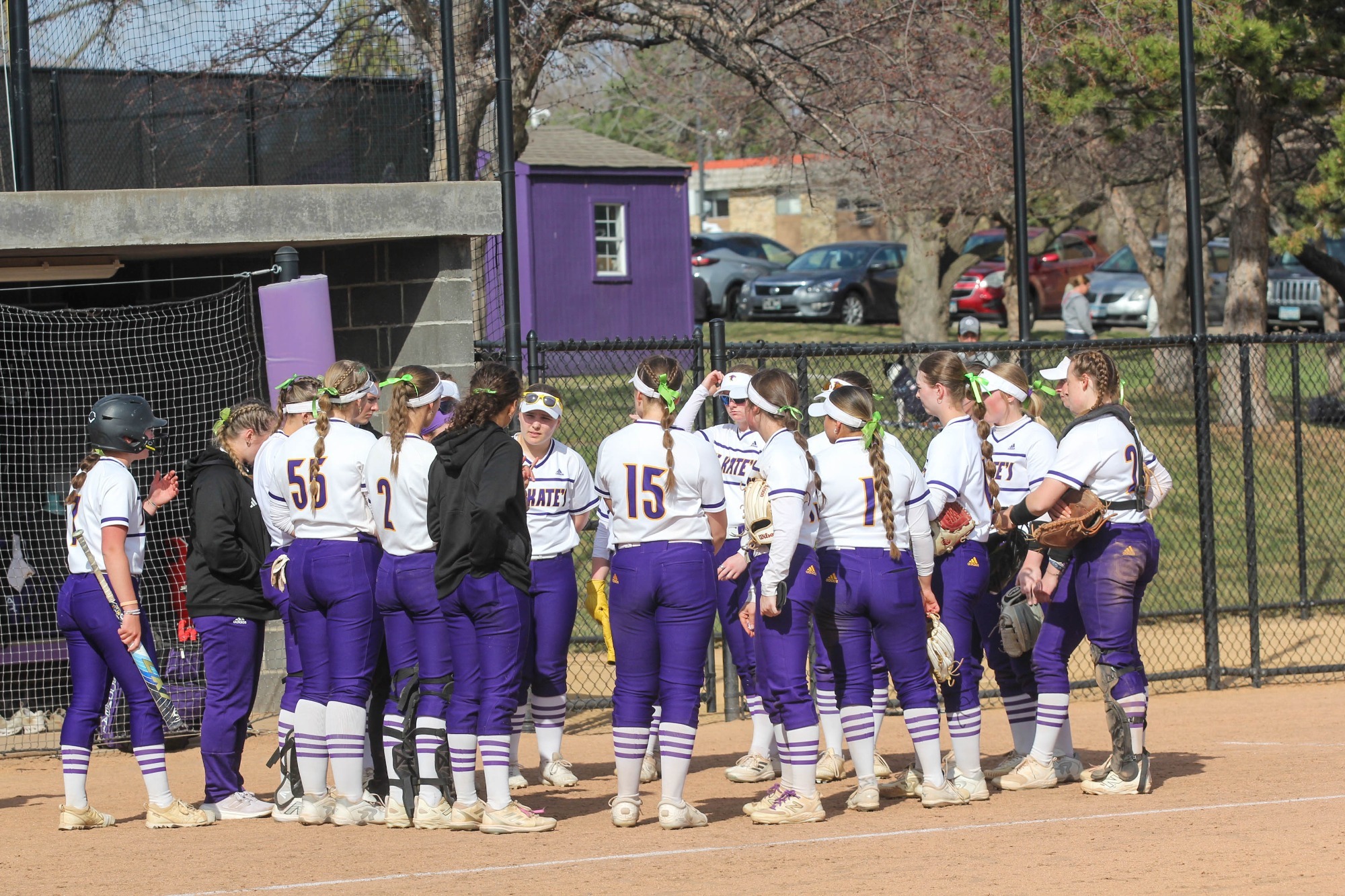 Softball team huddle