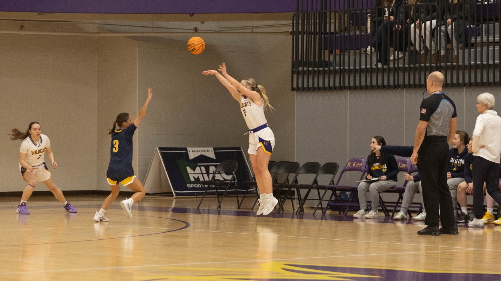 Hattie Fox shooting three-pointer at home