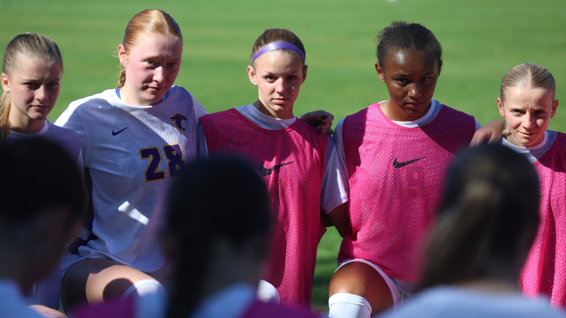 Soccer team pregame huddle